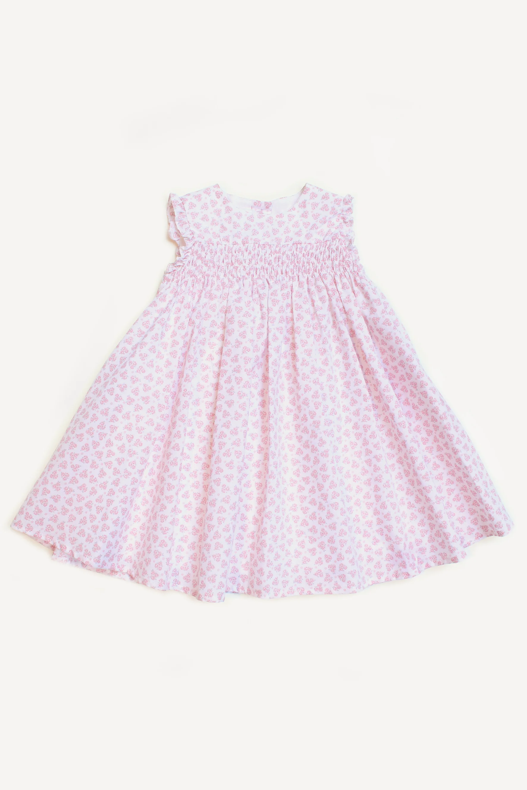 Vestito bambina punto smock a fiori rosa