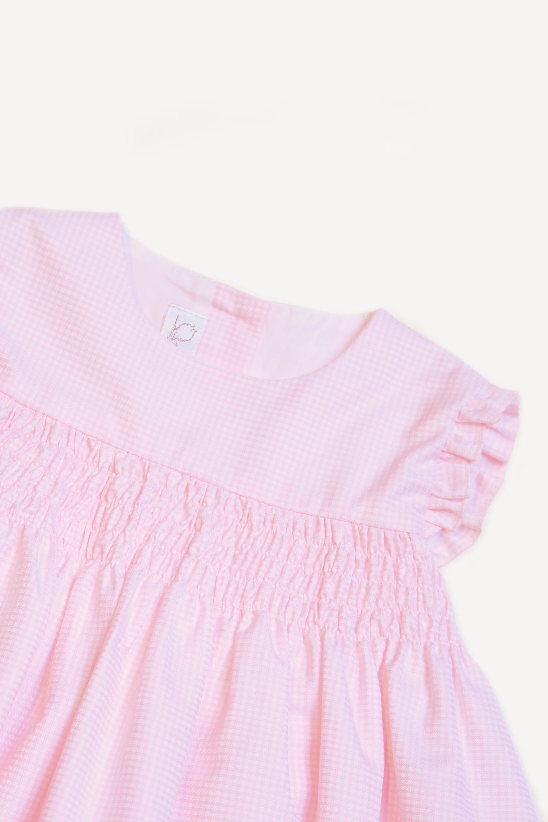 Abito bambina punto smock a quadretti rosa dettaglio