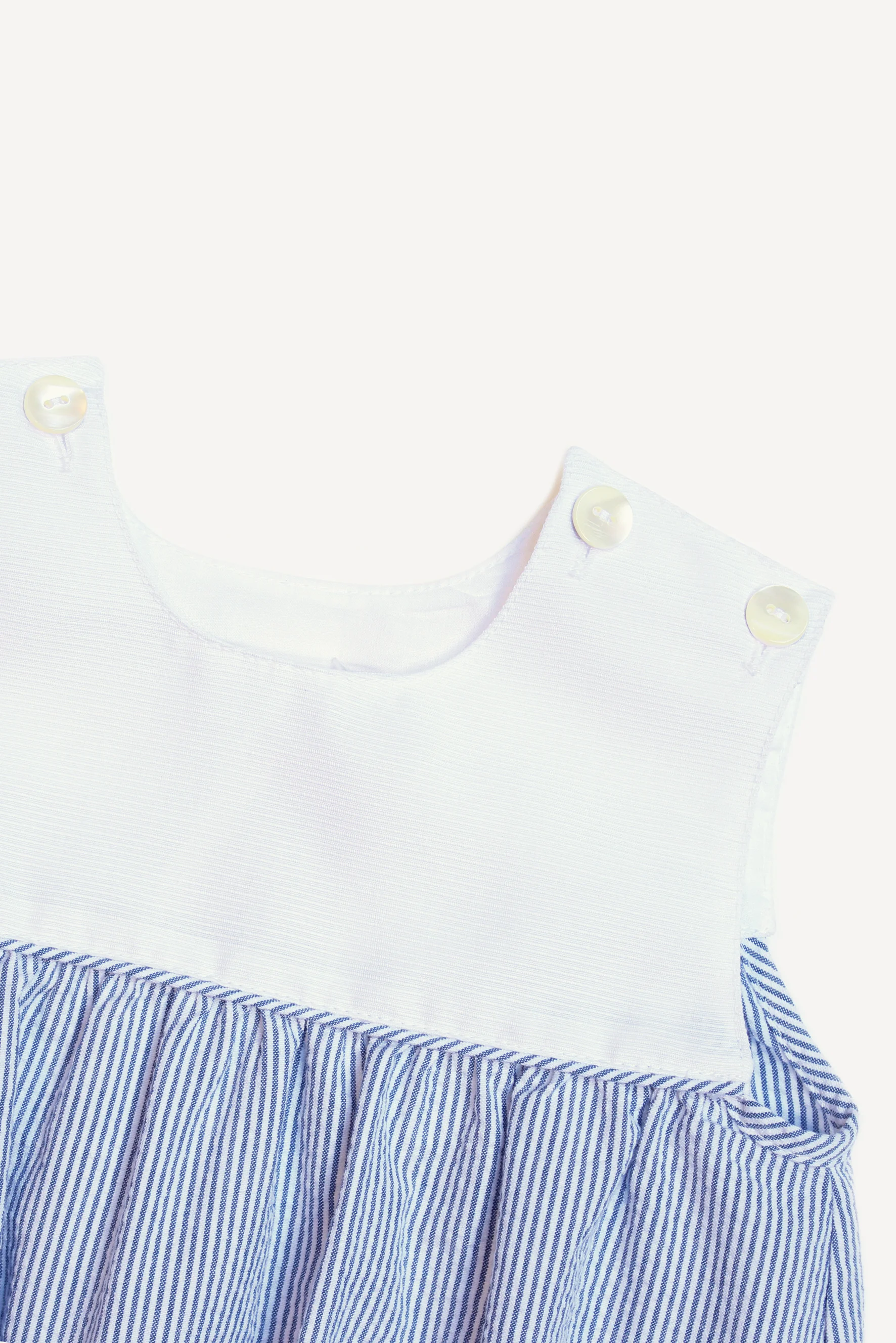Pagliaccetto neonato righe goffrato blu dettaglio