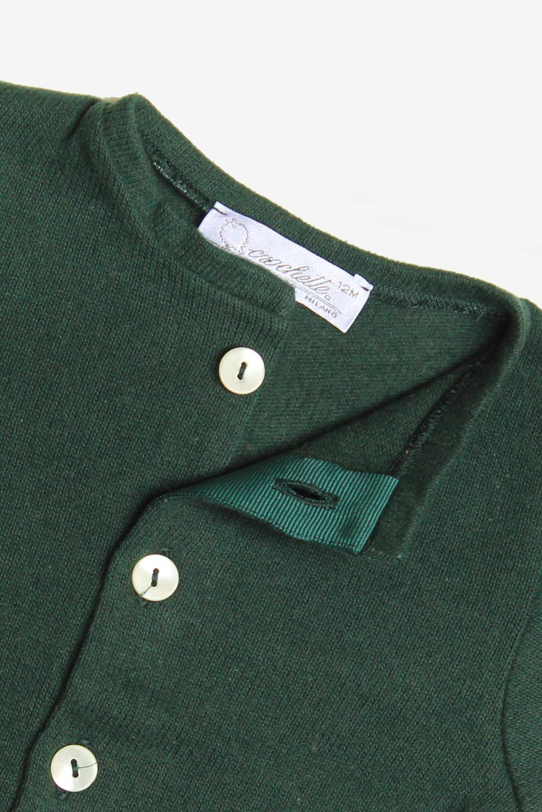 Cardigan bambino unisex in maglia verde dettaglio