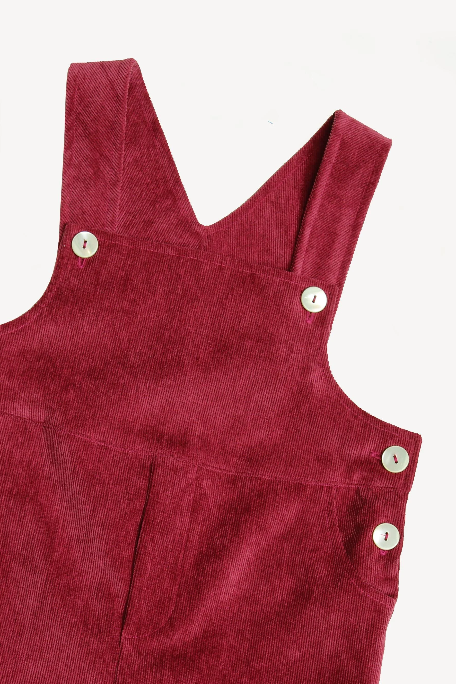 Salopette unisex in velluto bordeaux dettagli