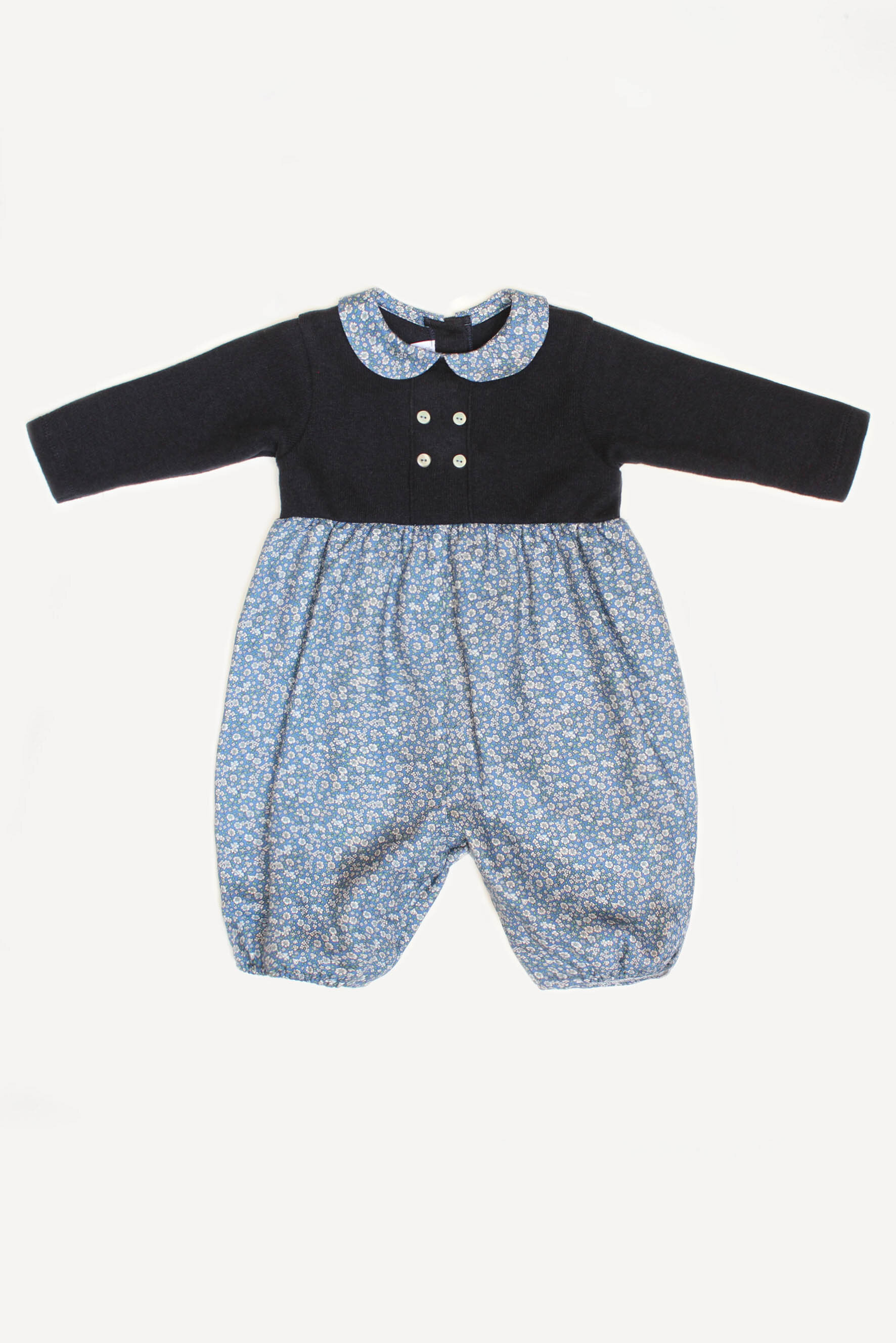 Pagliaccetto neonata in maglia blu e cotone a fiori avio