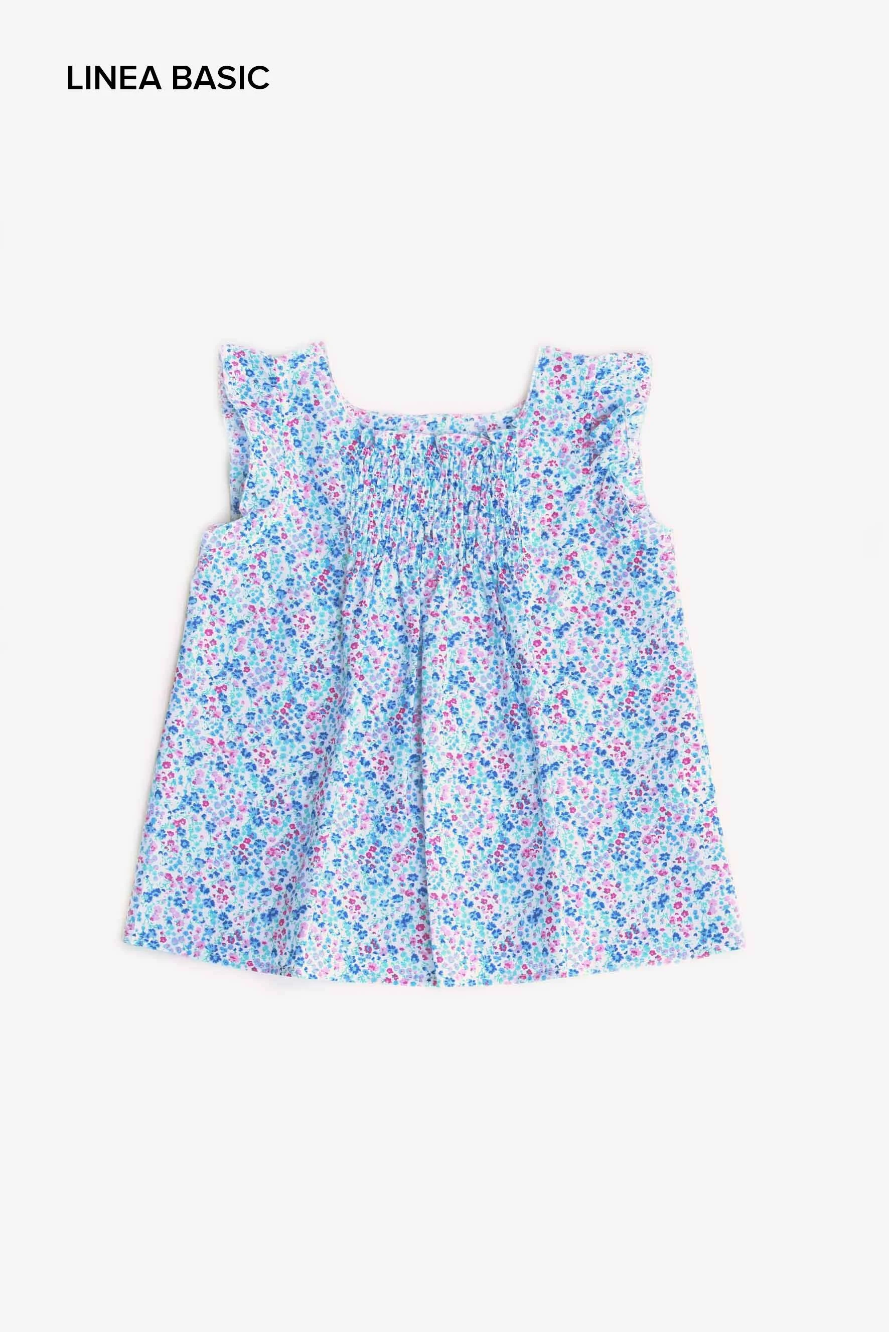 Camicia elasticata a fiori rossi blu e fucsia