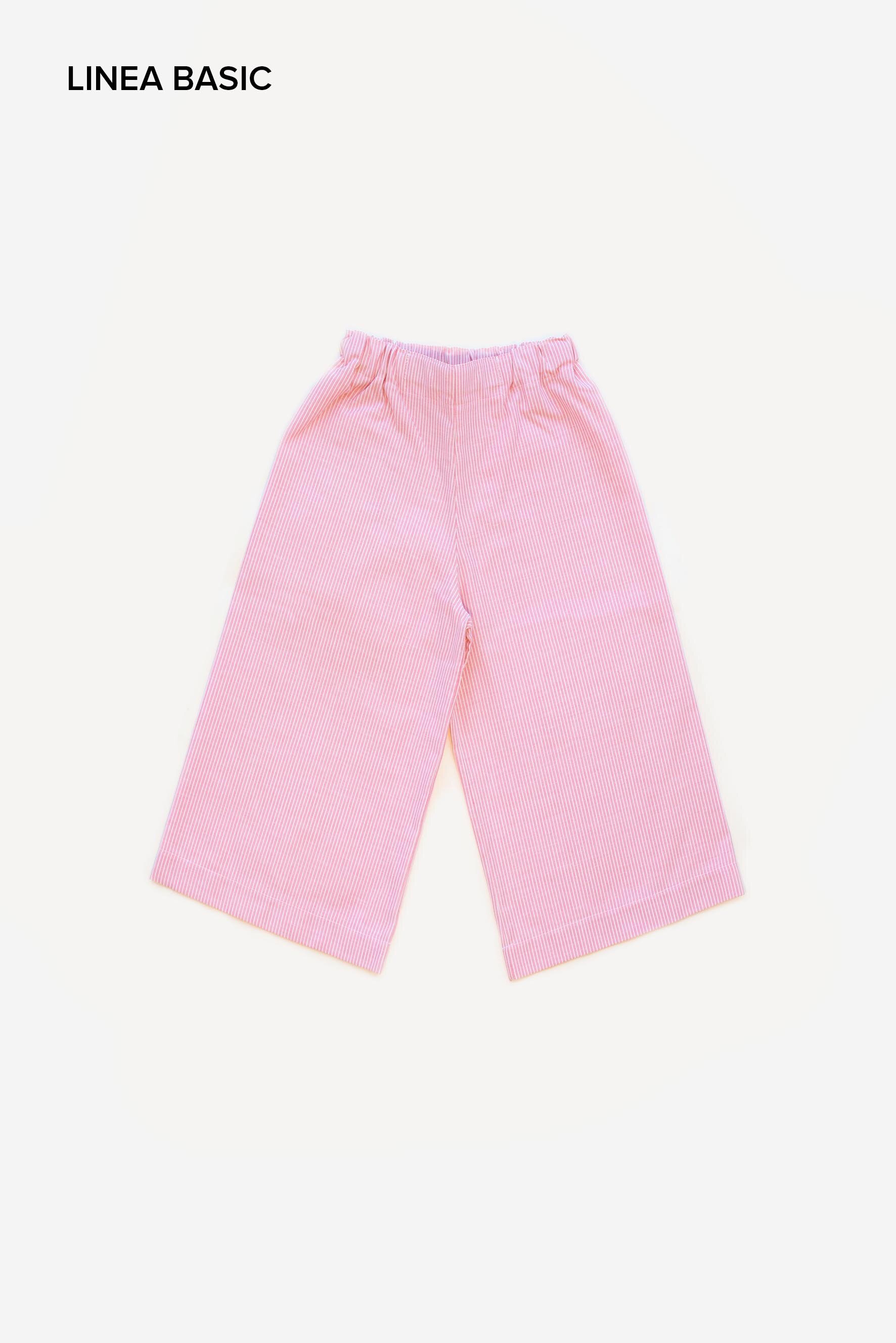 Pantaloni larghi bambina a righe corallo