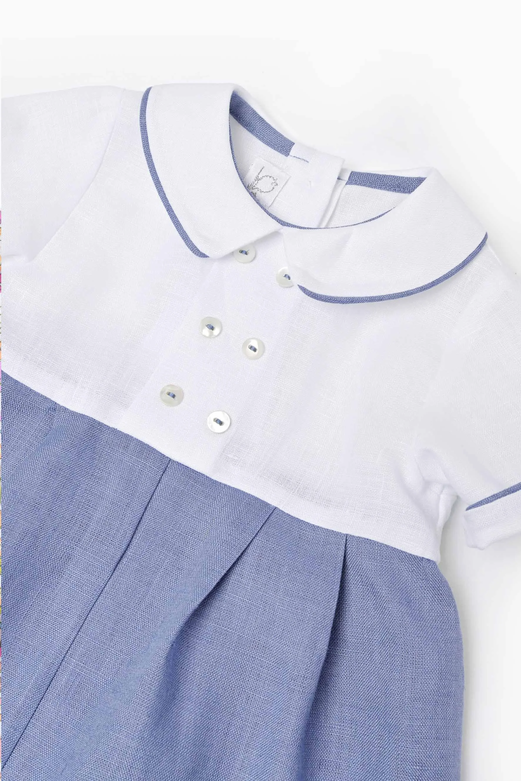 Pagliaccetto neonato lino bianco e tempesta