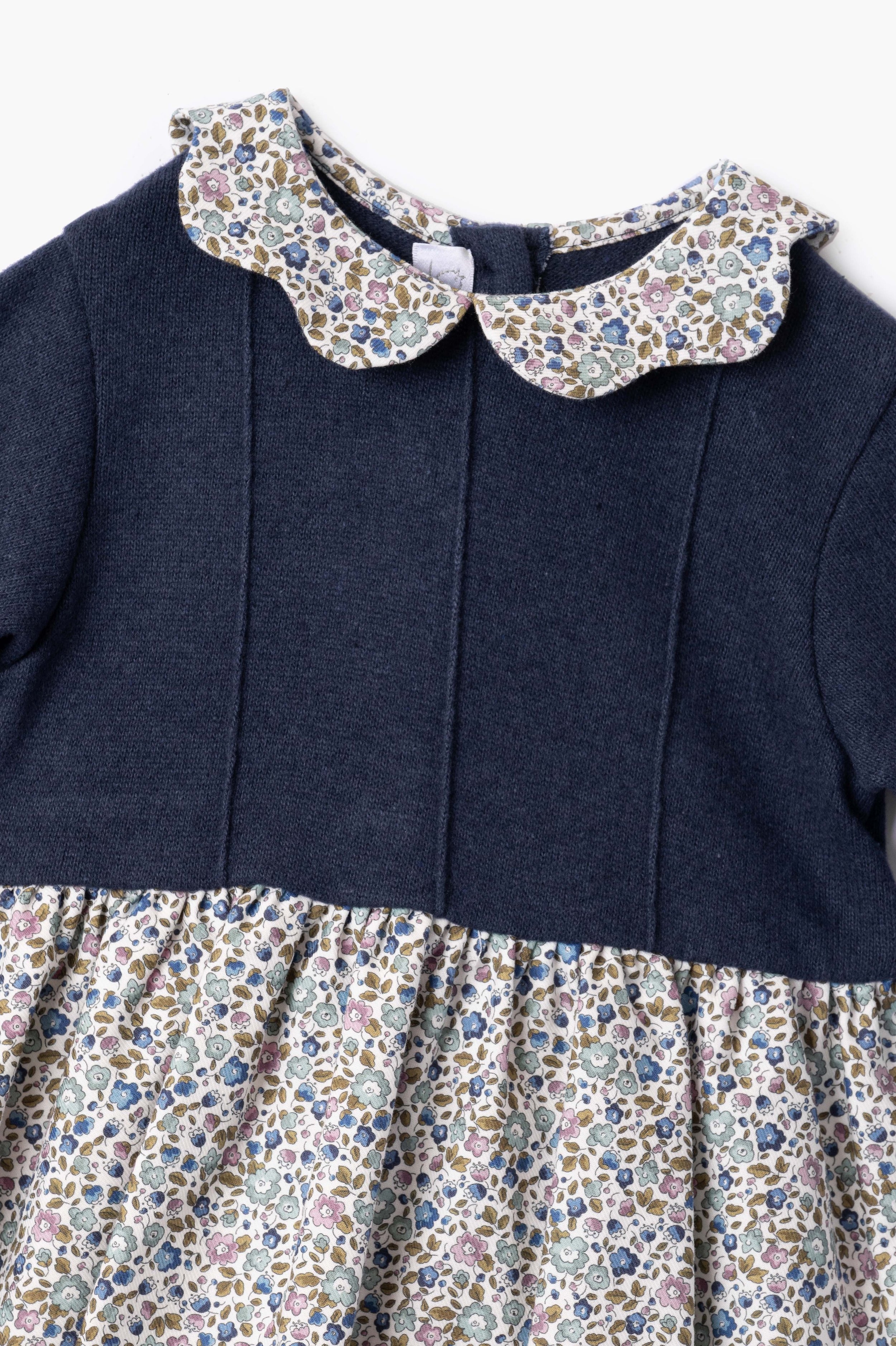 Vestito bambina blu e fiorellino blu