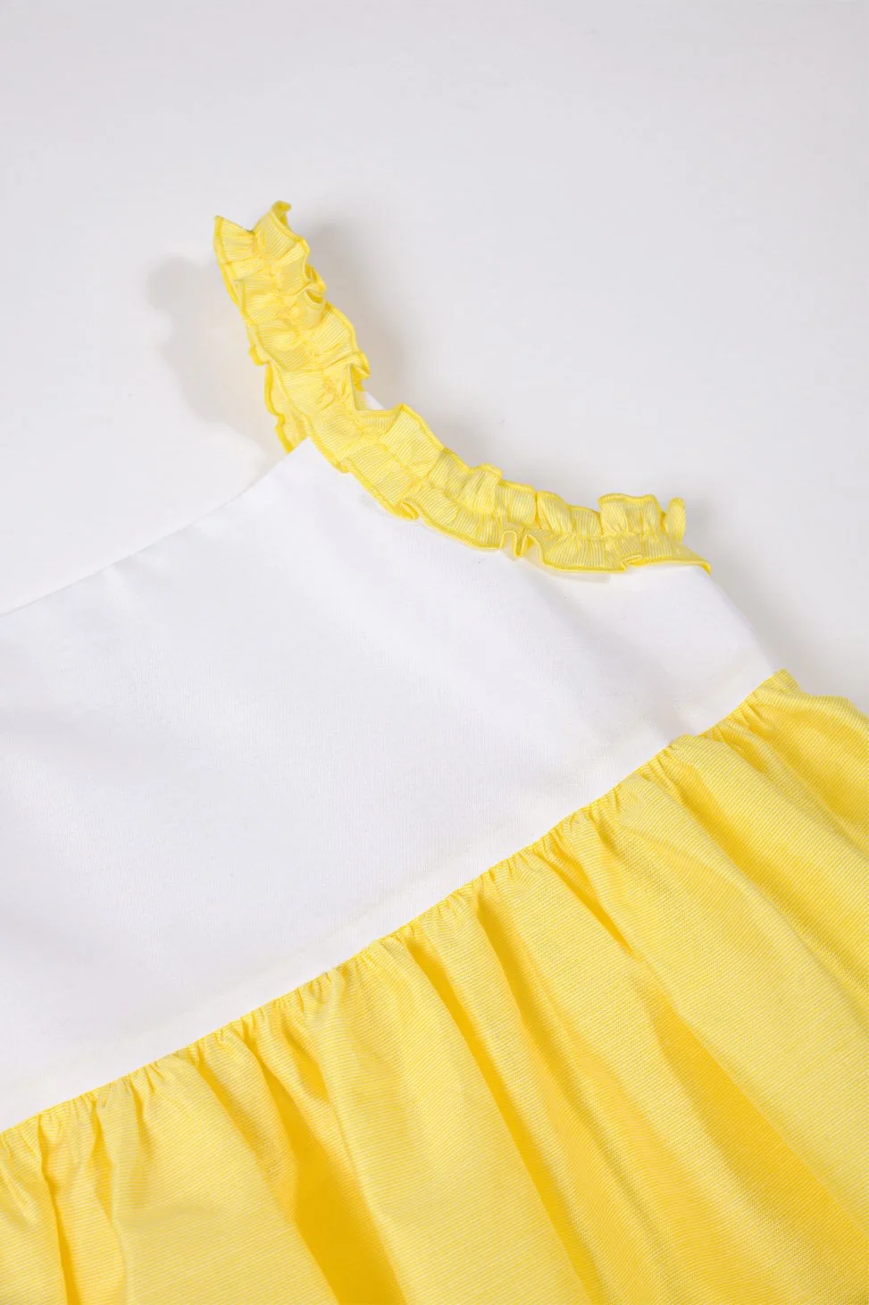 Scamiciato bambina Sole raso bianco e giallo dettaglio