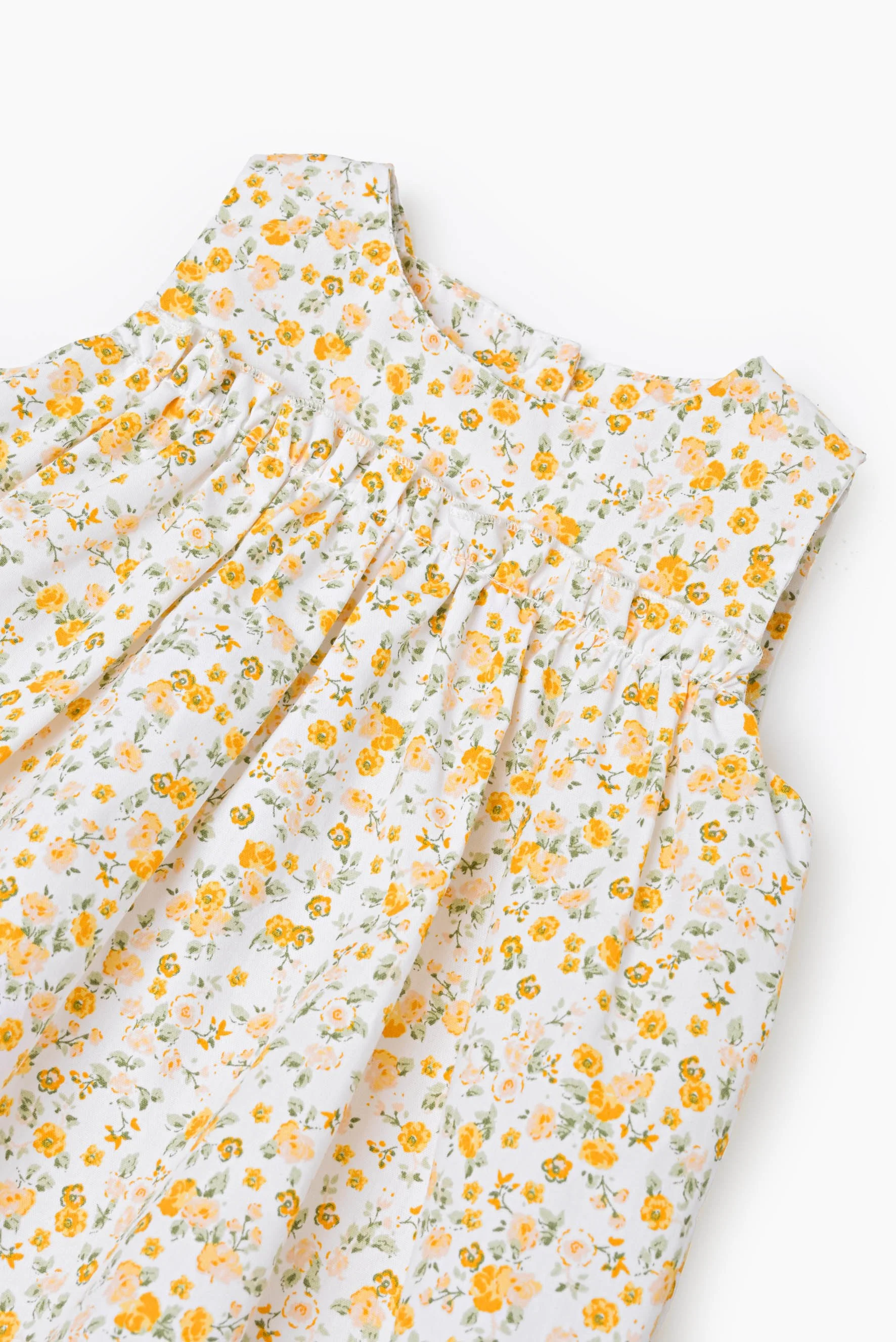 Pagliaccetto rouches fiore giallo dettaglio.jpg