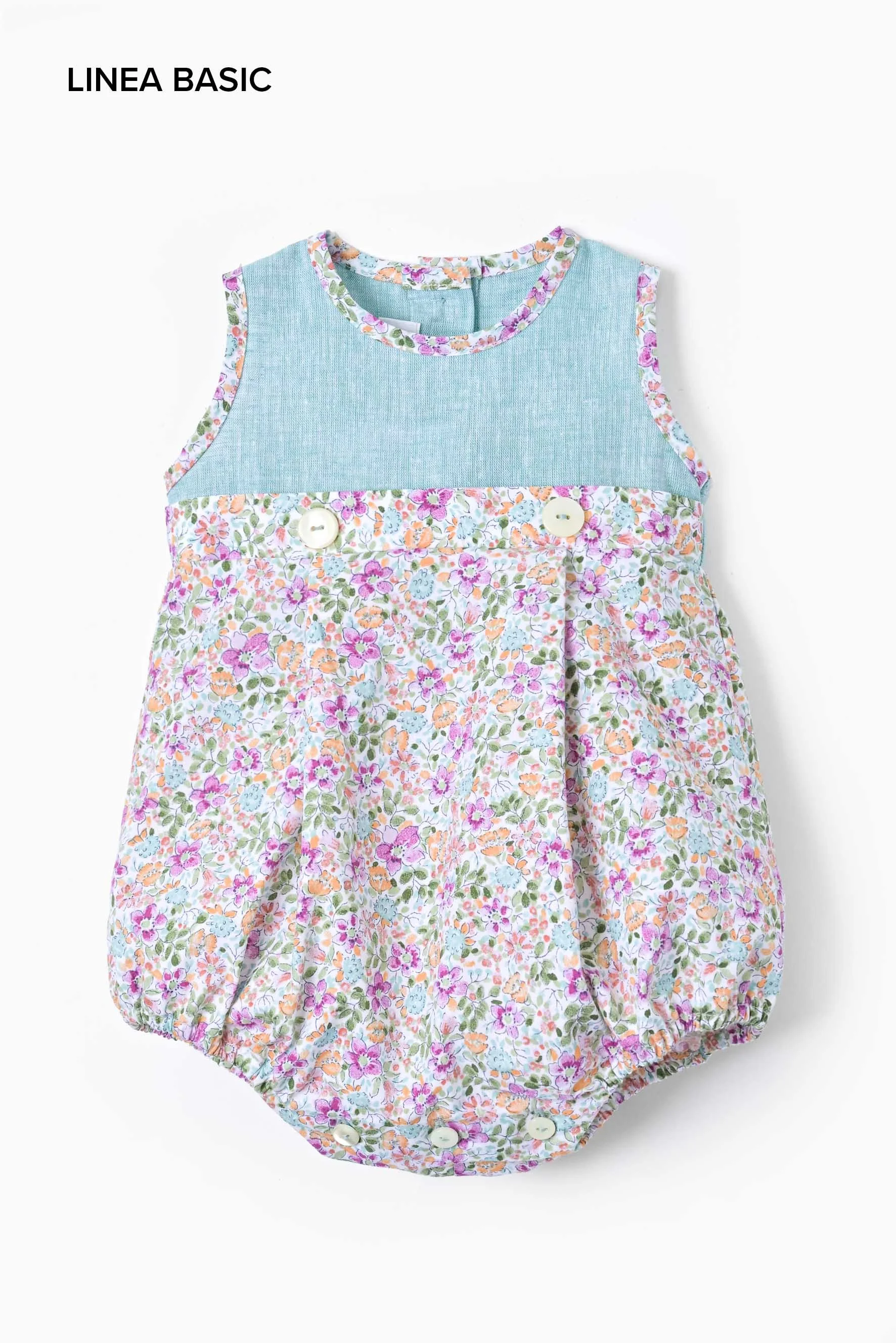 Pagliaccetto neonata lino turchese e fiore viola