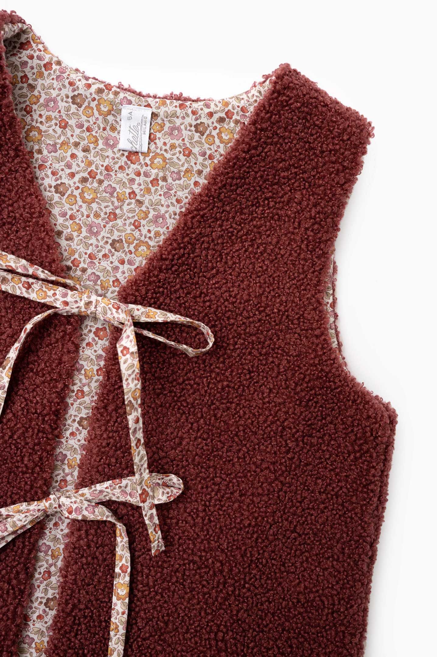 Gilet bambina Teddy Twist orsetto e fiore ruggine con fiocchi