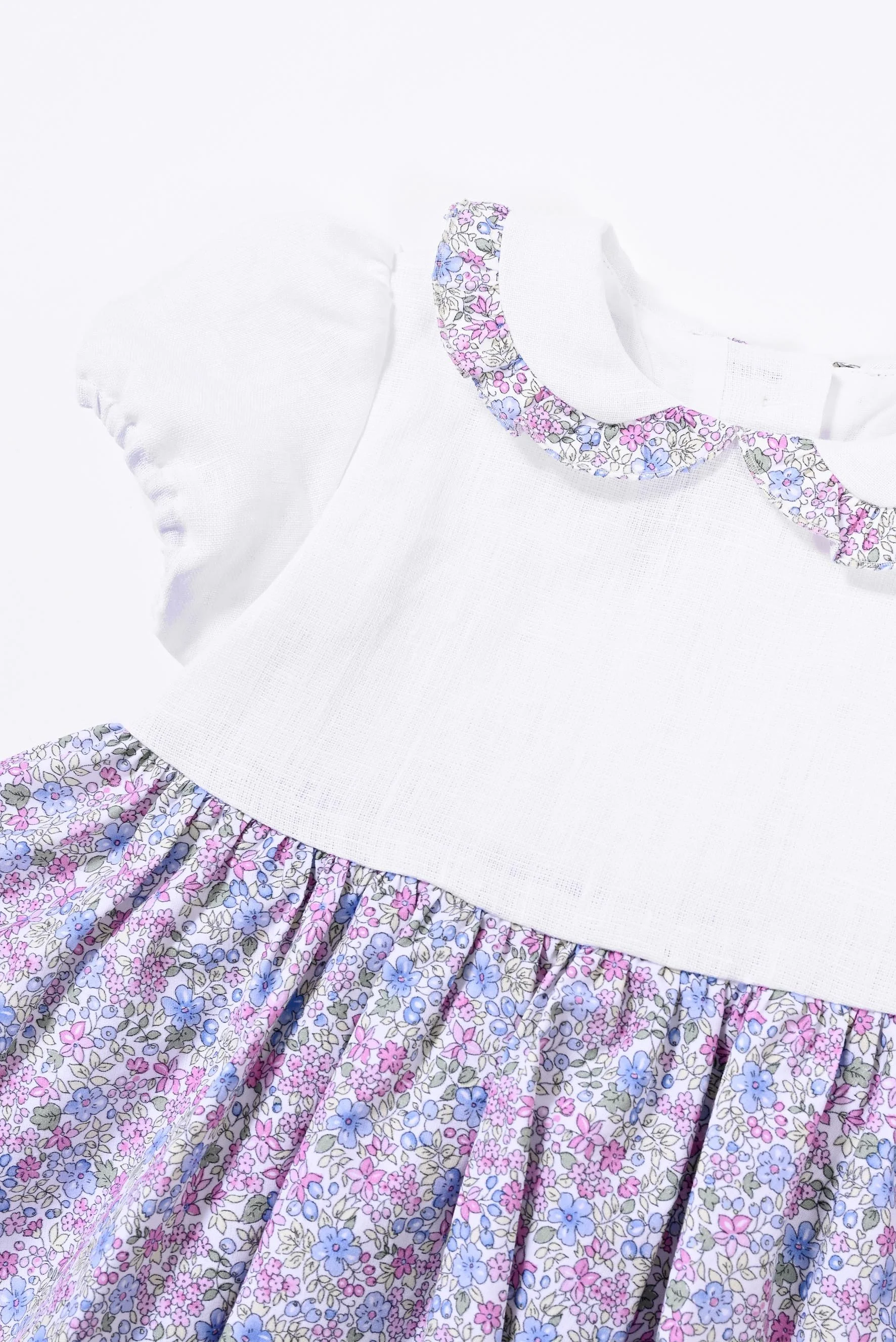 Vestito bambina lino bianco e fiore blu lilla dettaglio colletto