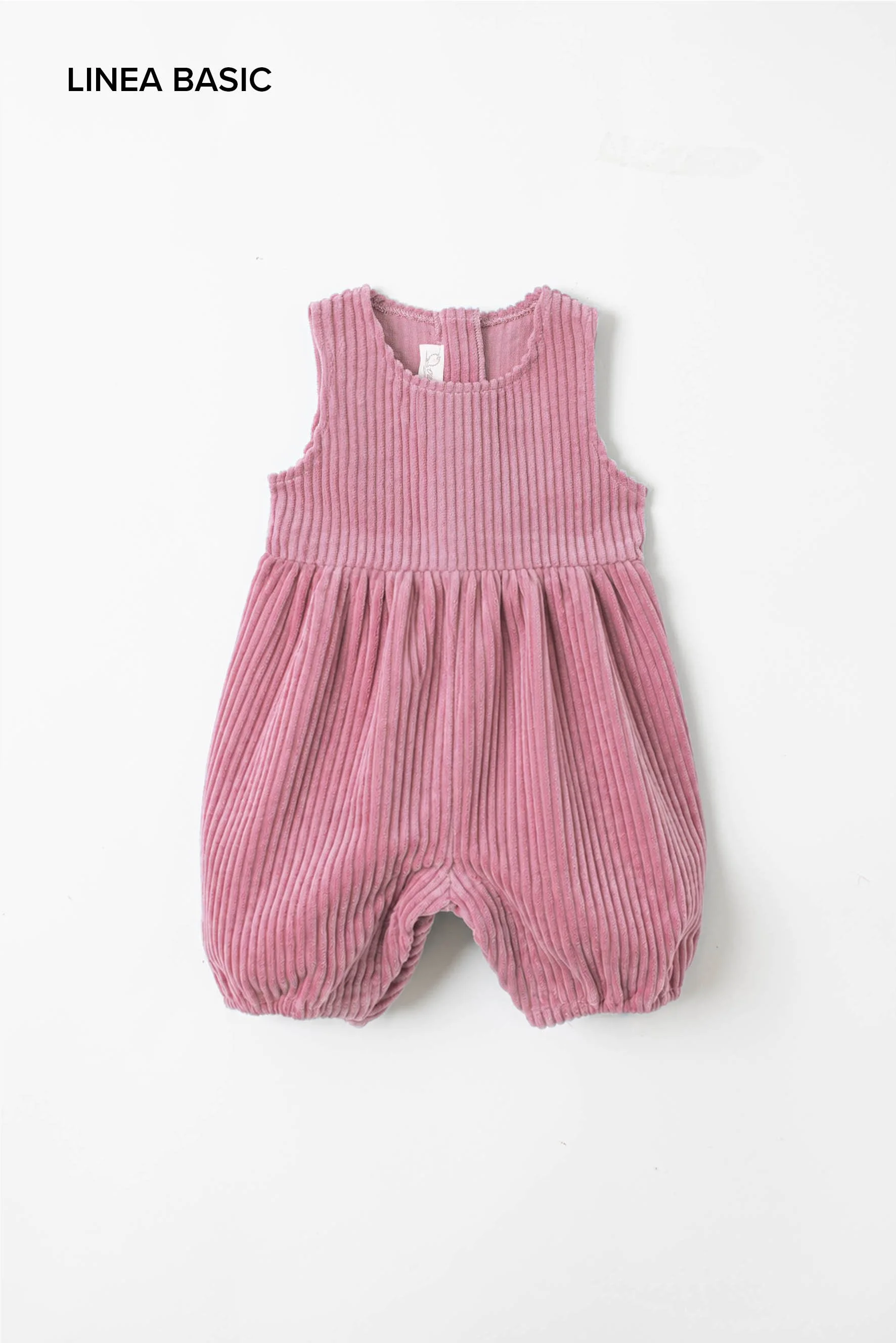 Pagliaccetto neonata velluto rosa polvere
