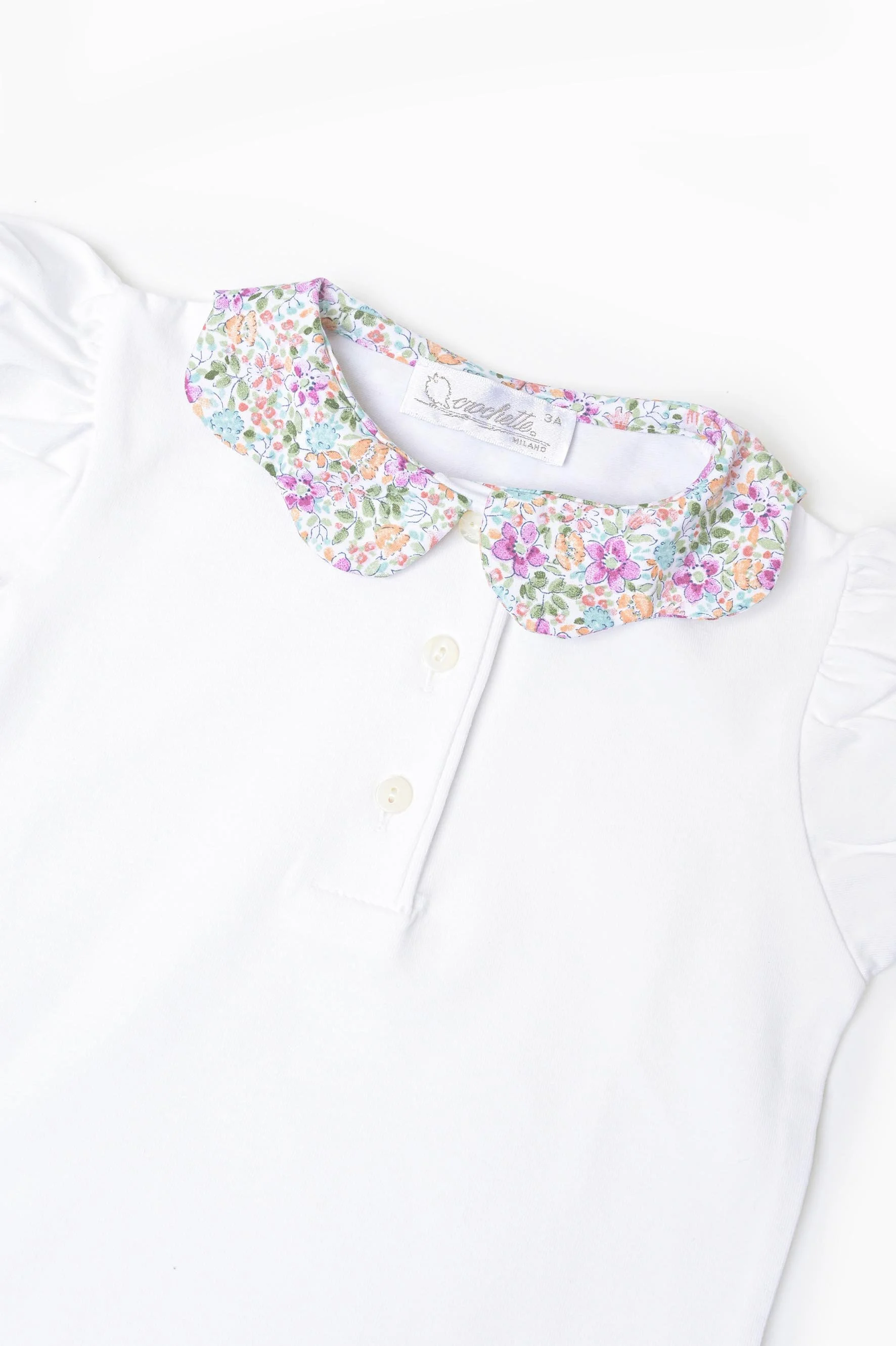 Polo bambina jersey bianco e fiore viola turchese Crochette