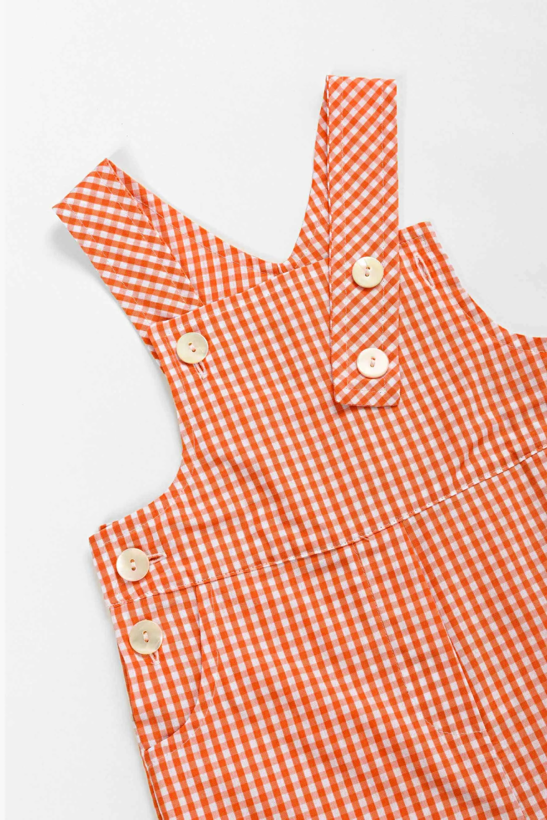 Salopette quandretto arancione Crochette