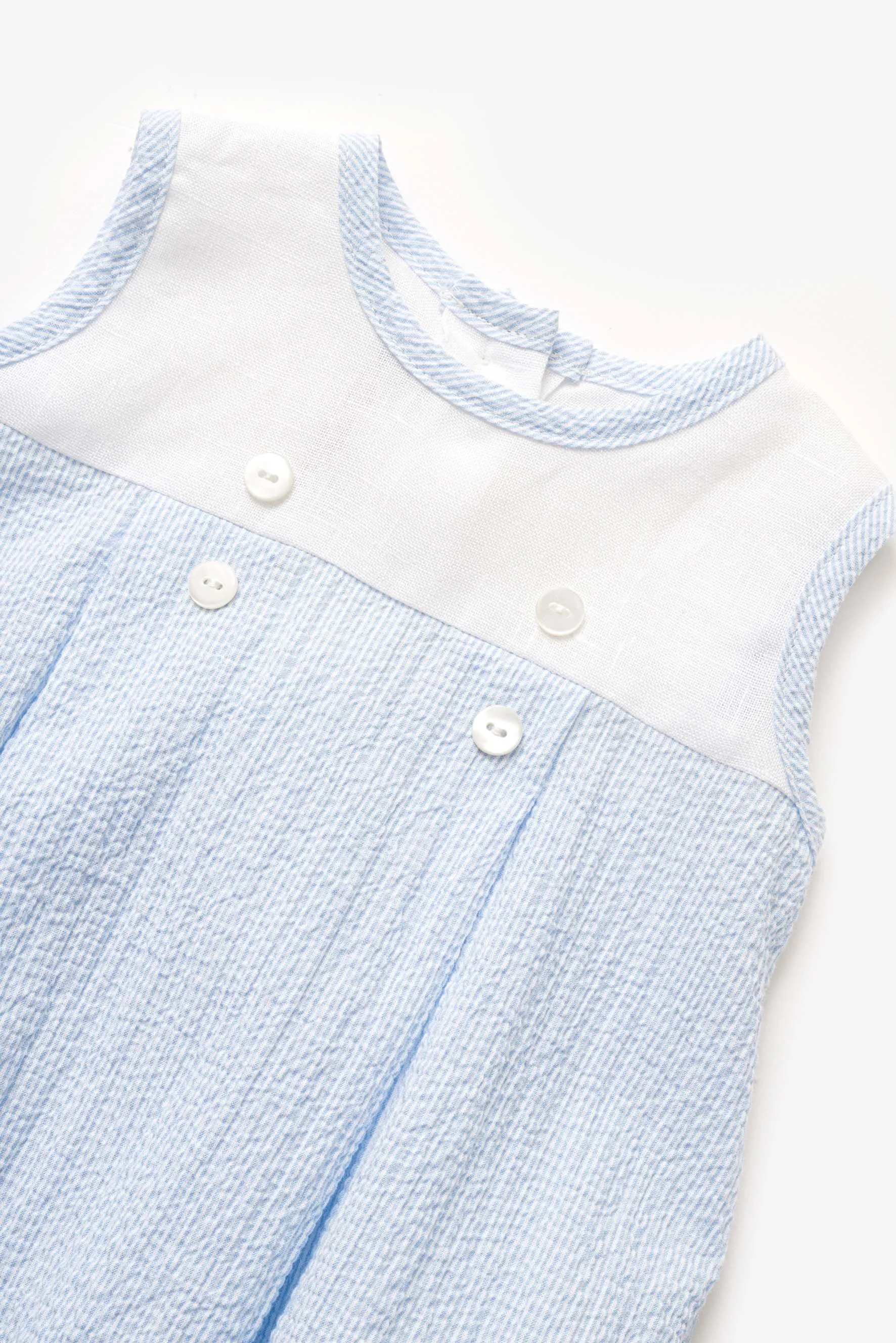 Pagliaccetto lino e righina celeste neonato