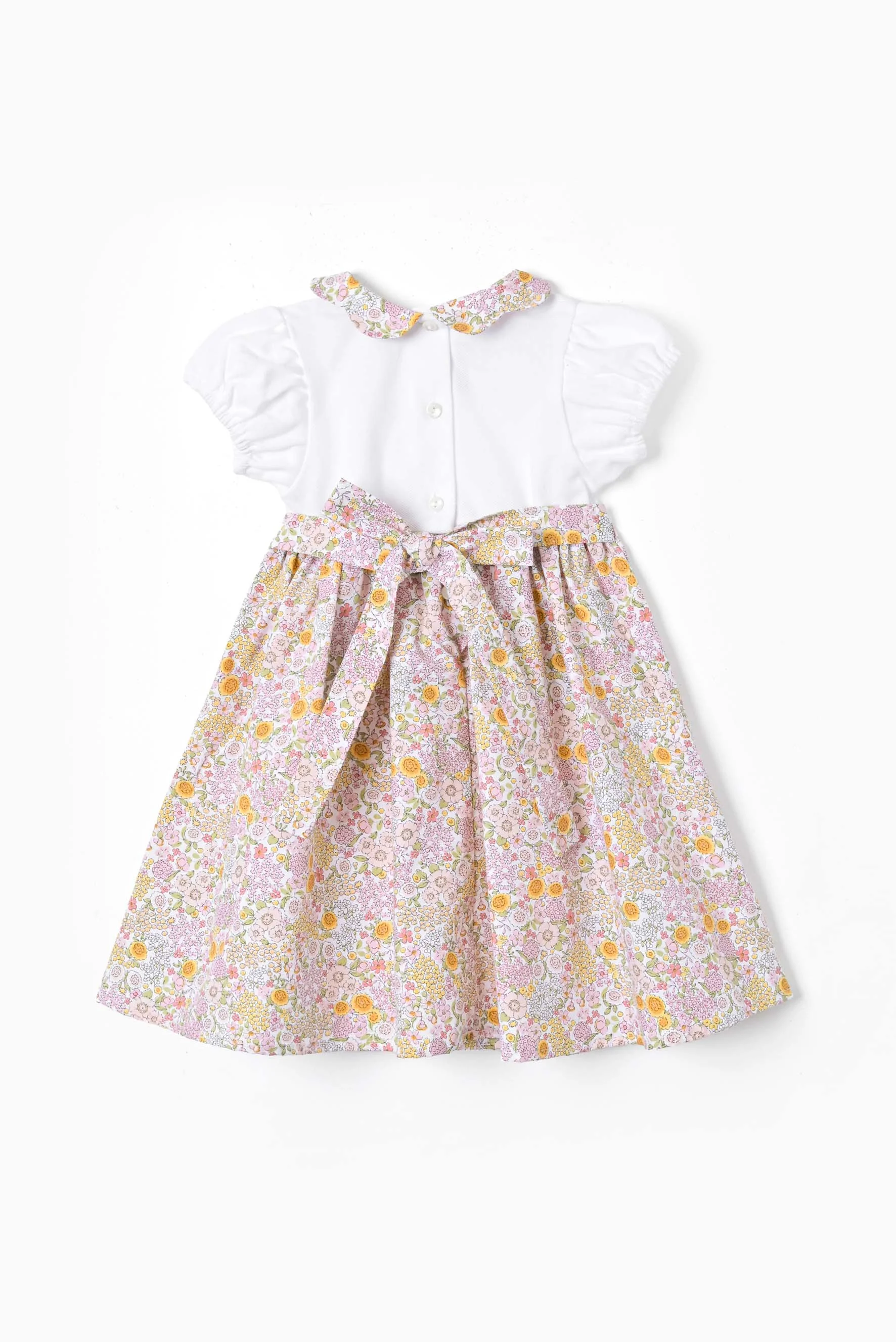 Vestito bambina jersey piquet e fiore rosa Crochette