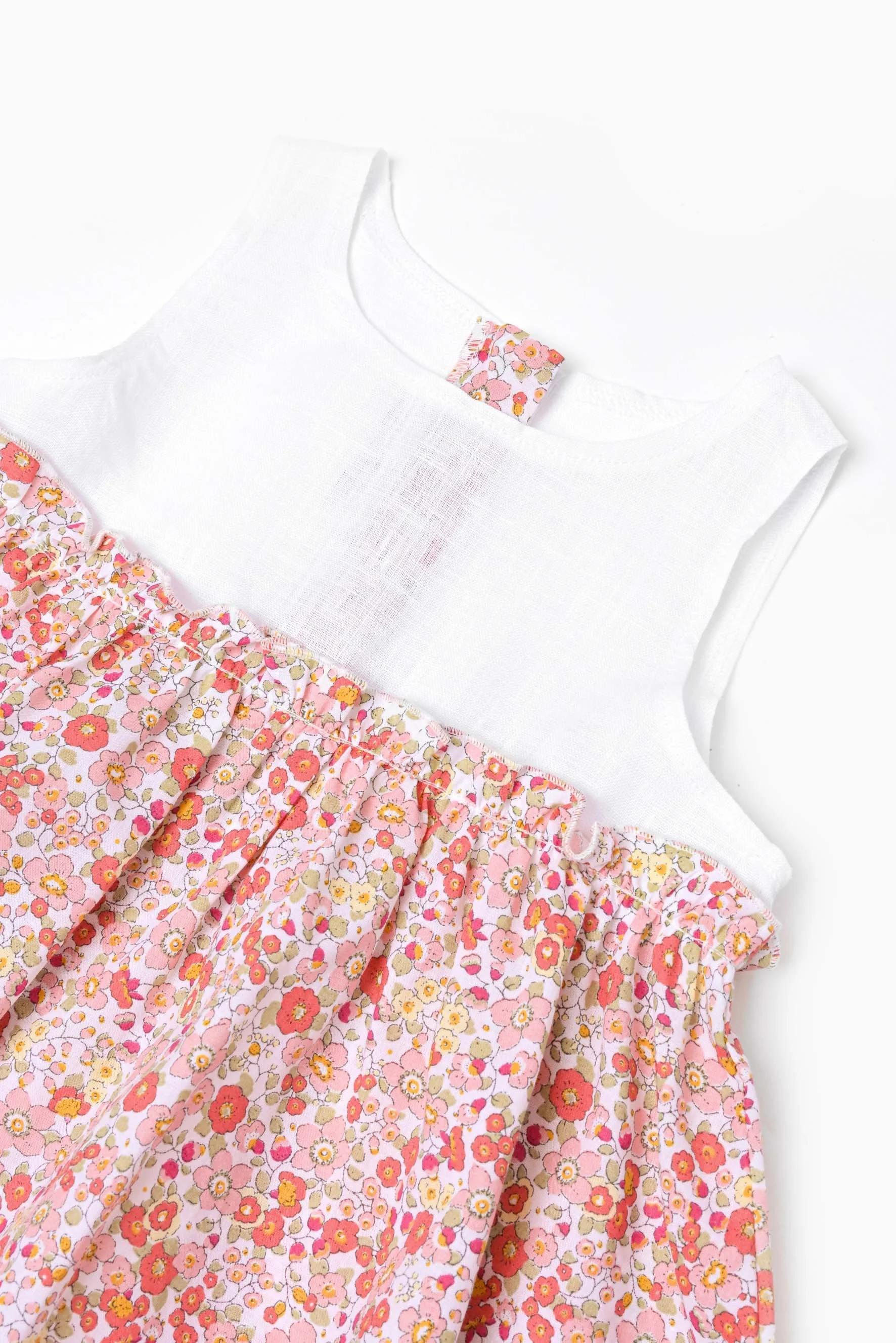 Scamiciato lino bianco e fiore arancio zoom.jpg