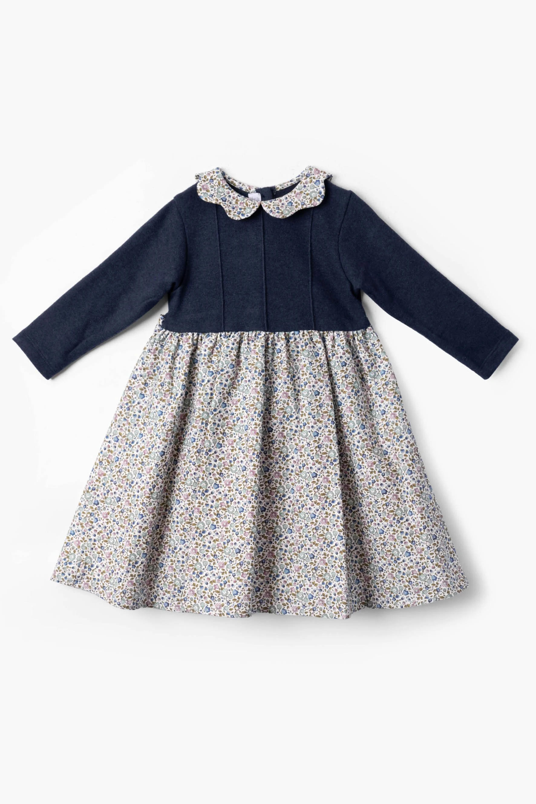 Vestito bambina maglia blu e fiorellino blu