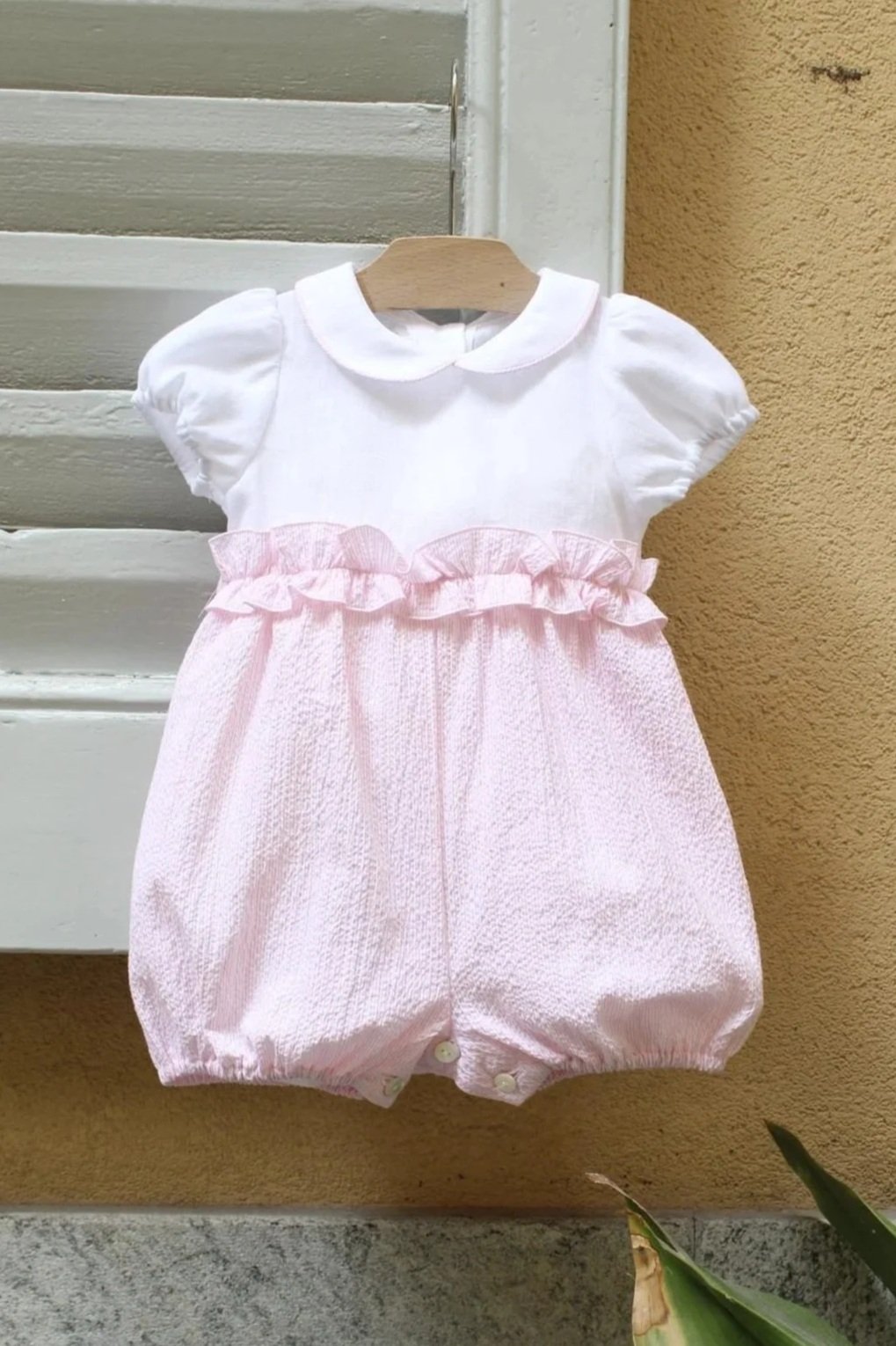 Pagliaccetto neonata bianco e righina rosa con rouches