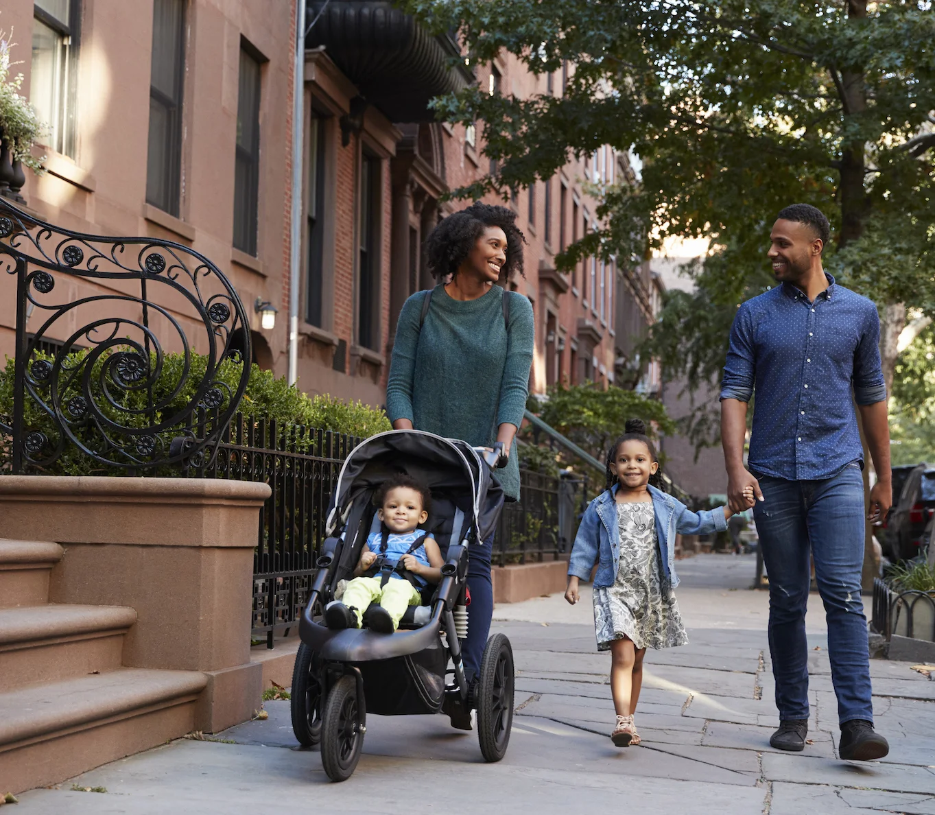 Family walking down urban street_web.jpeg