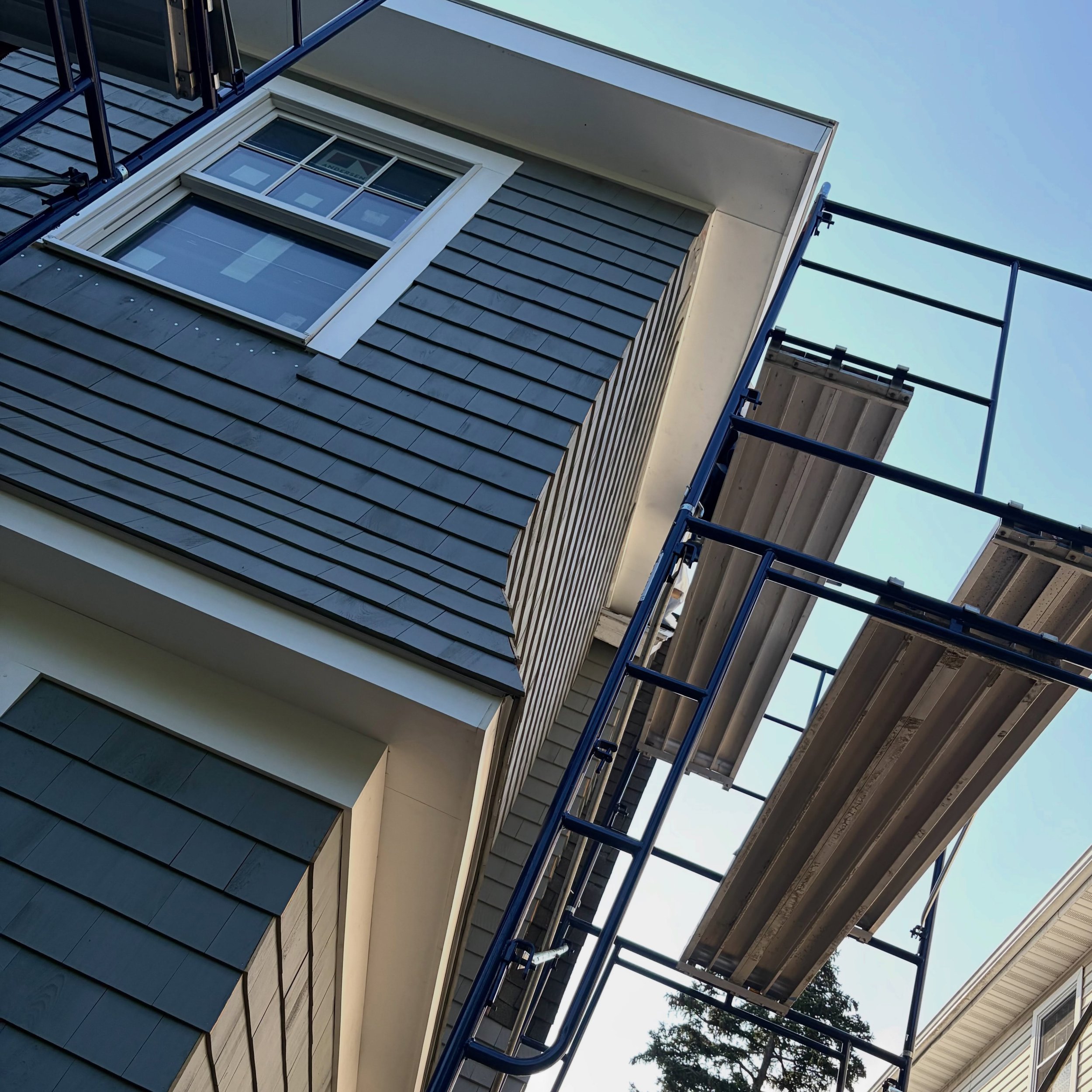 Ongoing exterior shingle work on a Westchester house. #shinglestylehome #westchestester #residentialadditions #reidarchitecture
