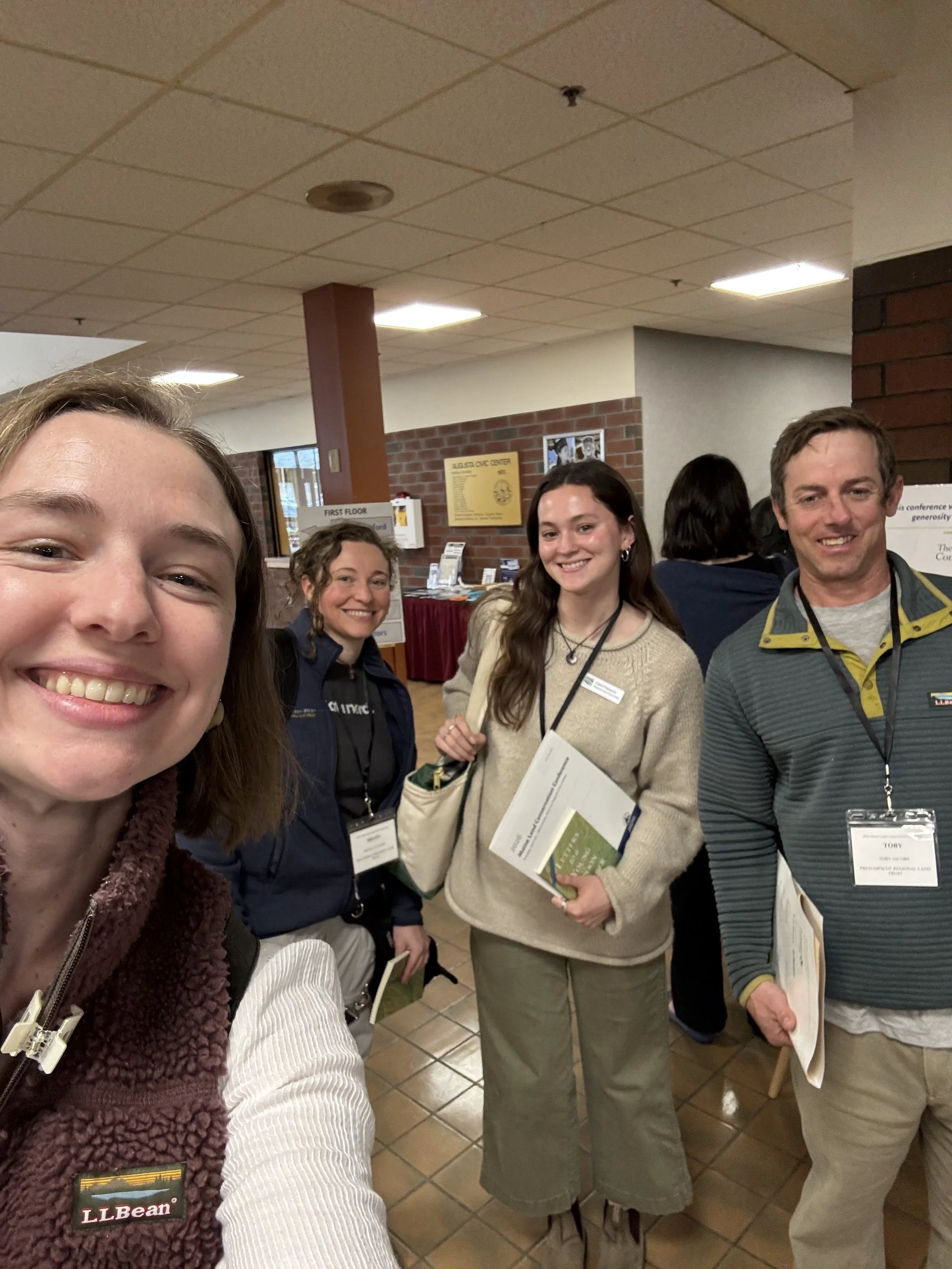 selfie of four staff members