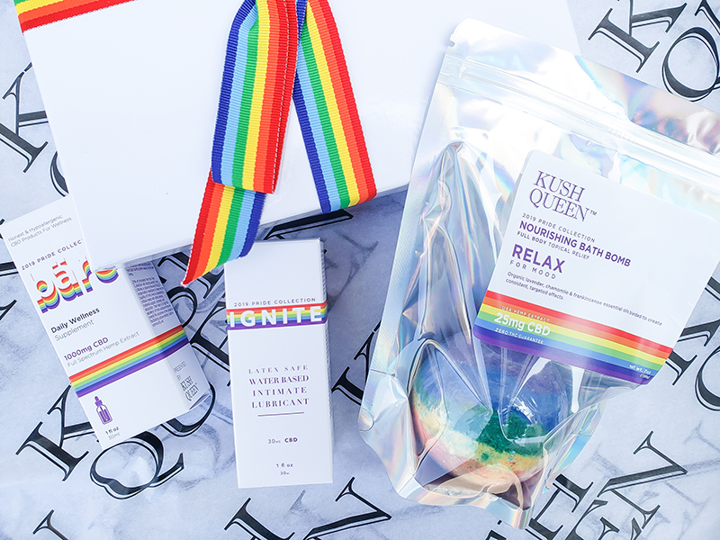 Complete 2019 Pride Collection by Kush Queen with tincture, lubricant and bath bomb on branded Kush Queen tissue paper. 