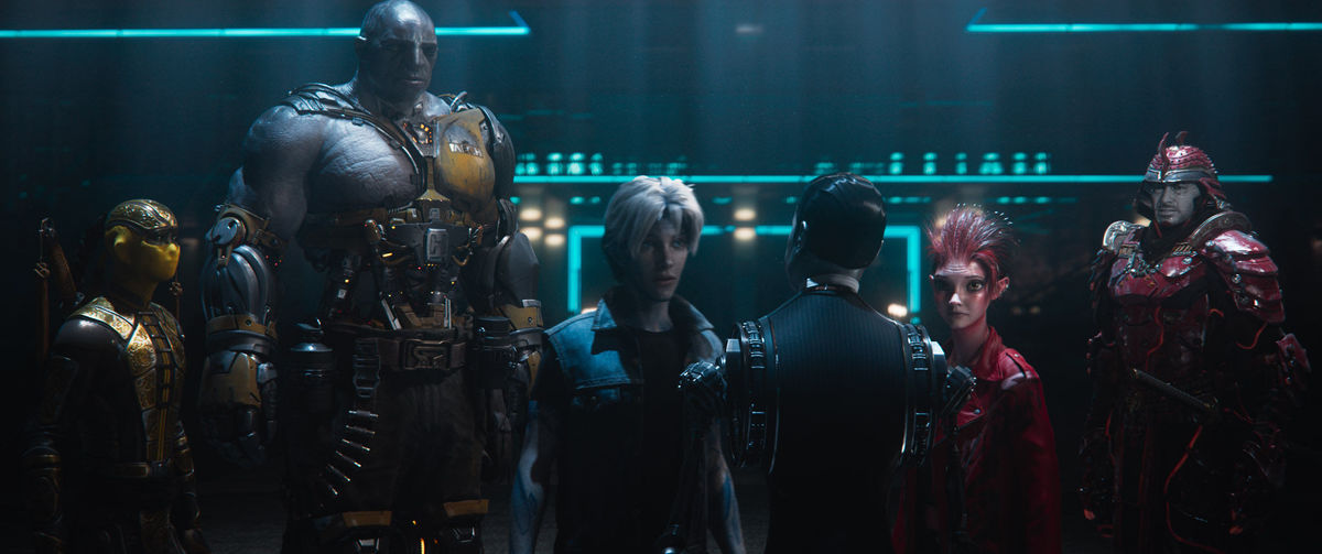 The High Five inside the OASIS, from left to right: Sho (Philip Zhao), Aech (Lena Waithe), Parzival (Tye Sheridan), Art3mis (Olivia Cooke), and Daito (Win Morisaki)