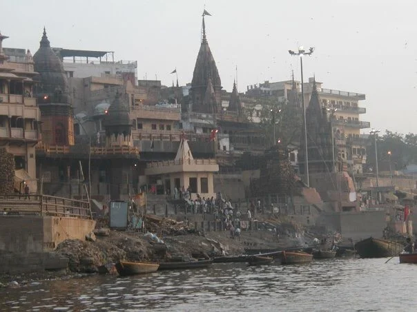 The funeral ghat as seen from a boat on the River Ganges, Varanasi.