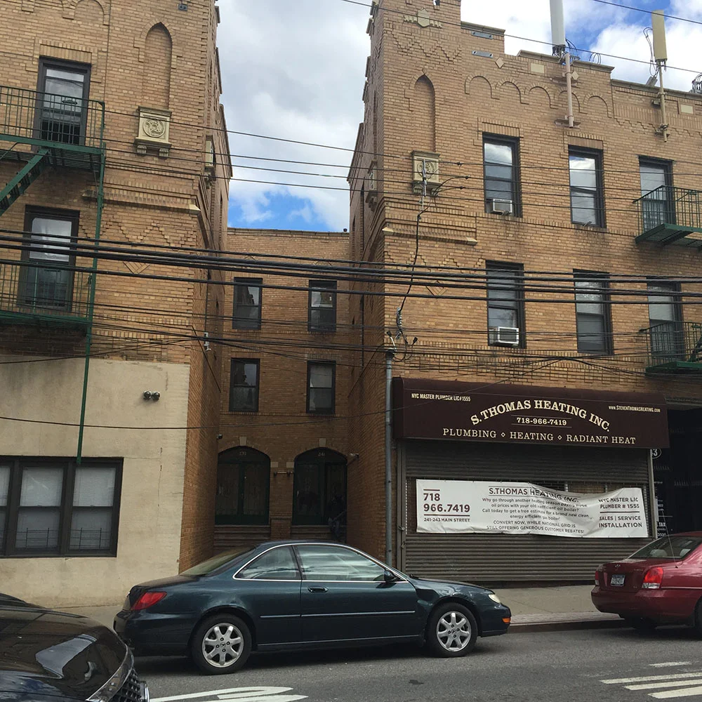  Many Main Street storefronts fails to activate the street. &nbsp;A banner advertisement obscures most of the window of this heating and plumbing business.&nbsp;   