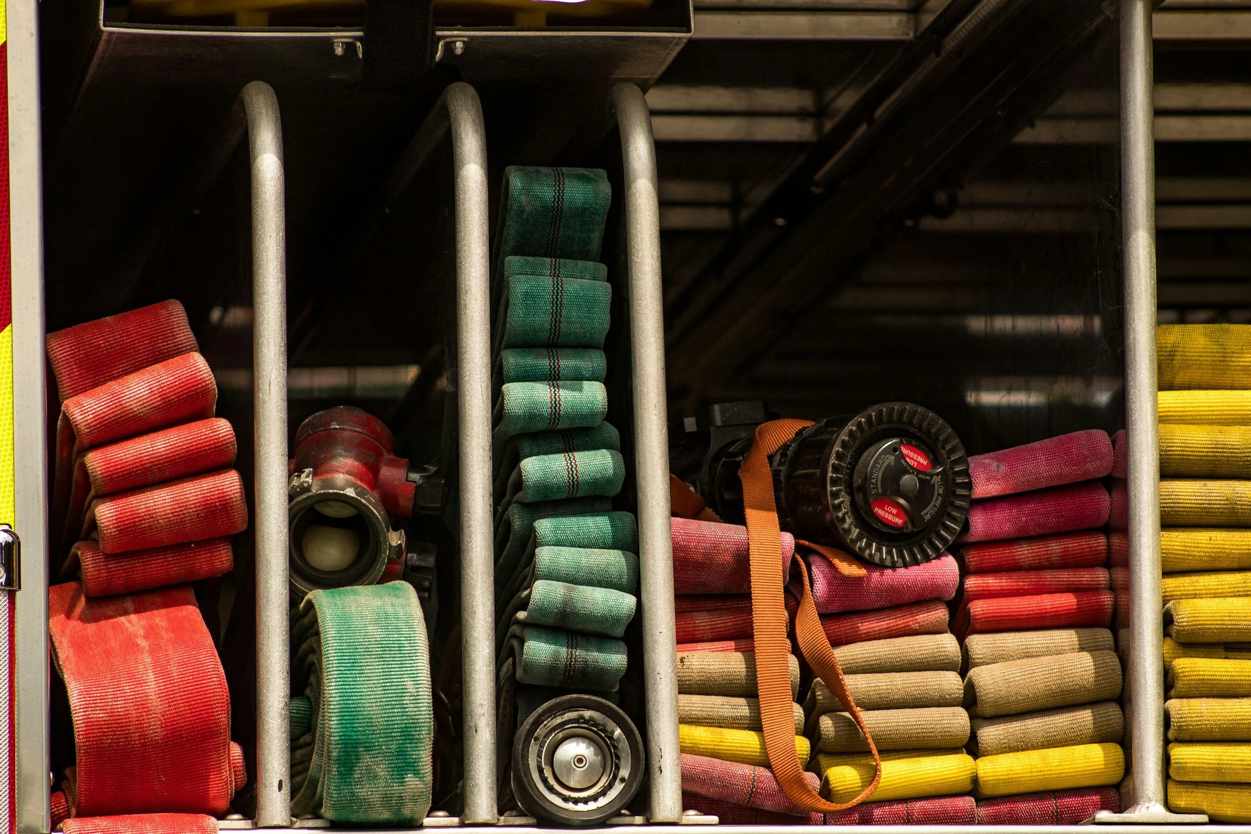 Fire hose storage rack
