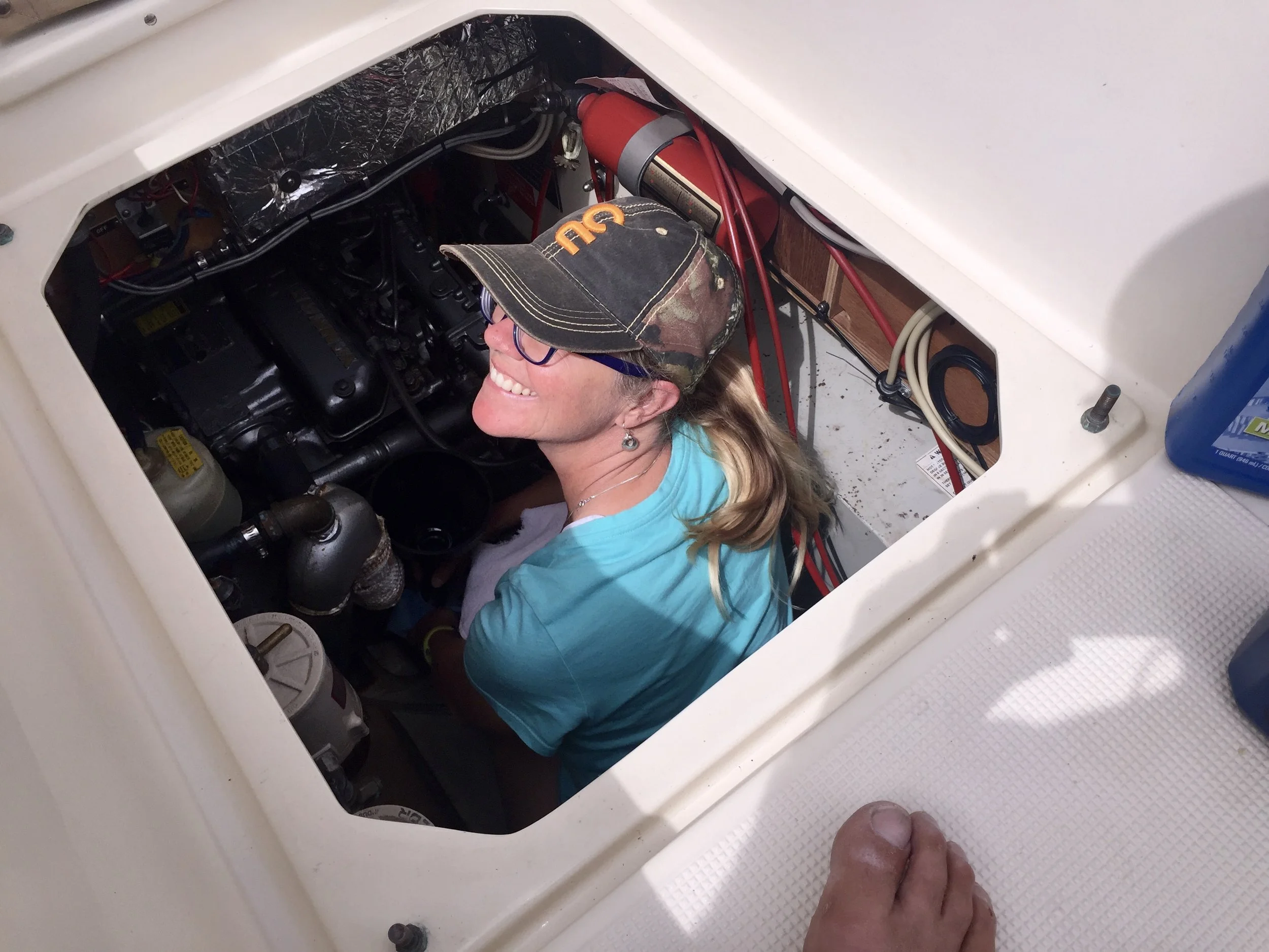 Sometimes big person strength is an asset. Sometimes small person flexibility is a better tool. On transmission fluid day, one of us was better suited than the other to engine area crouching.