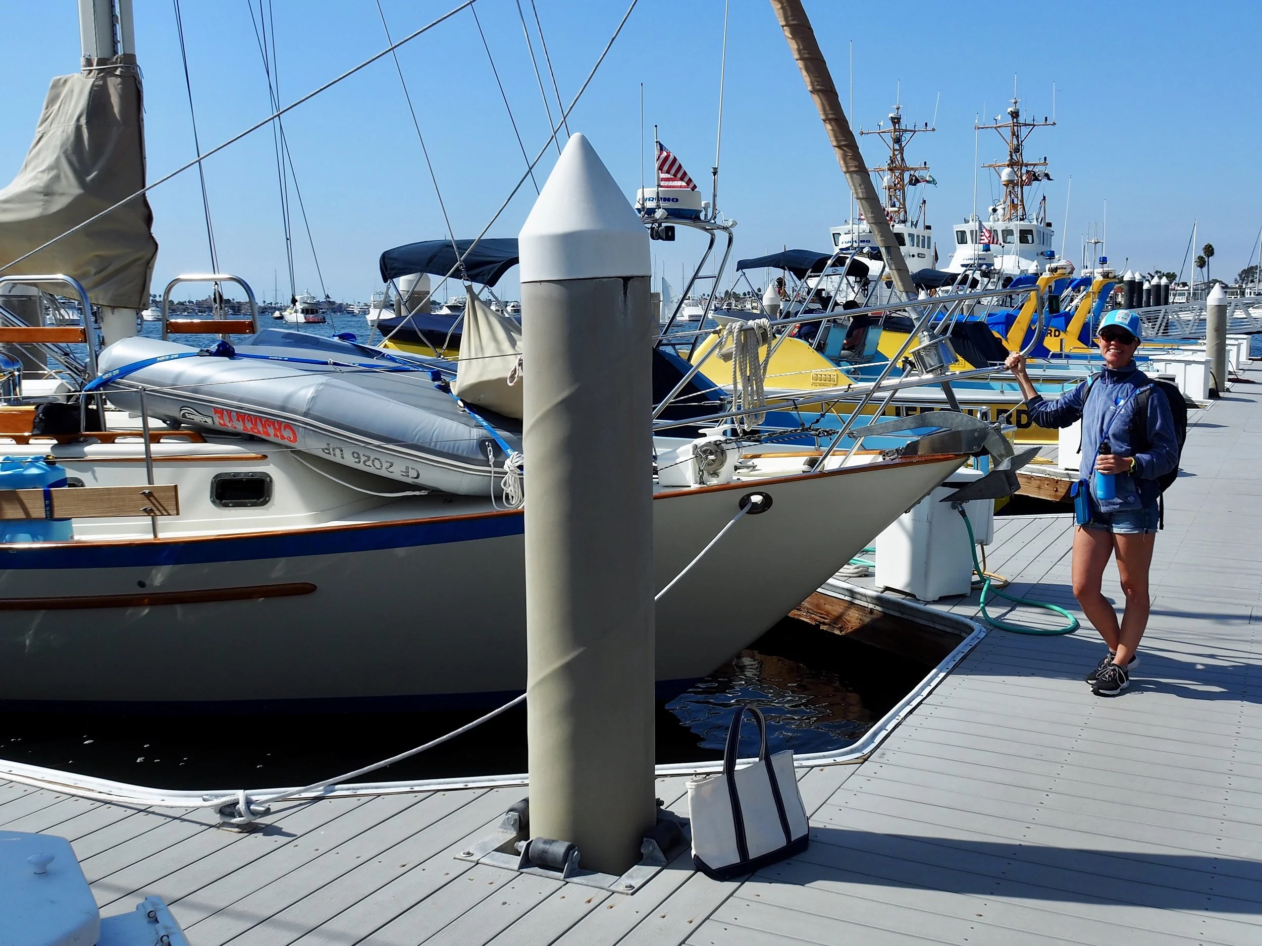 At the coast guard dock at Newport, ready to set off on errands using our new primary mode of transportation: walking shoes.