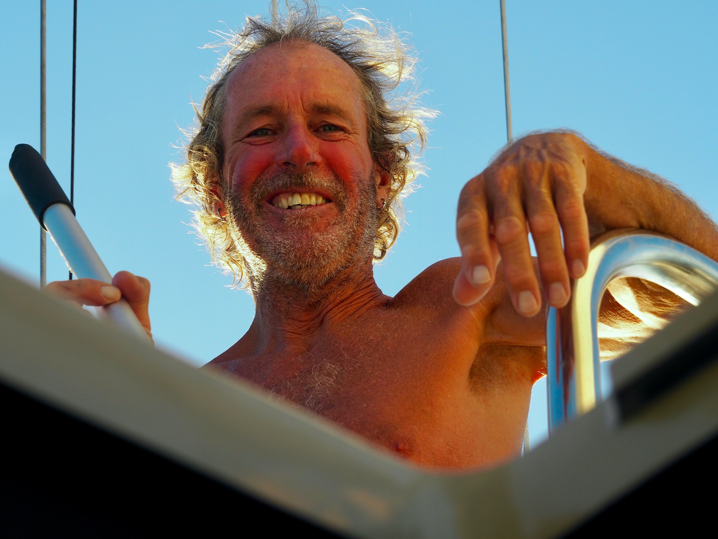 Colin’s happy place, scrubbing the decks topsides. Seriously, am I lucky or what? This man loves a clean boat even more than I do.