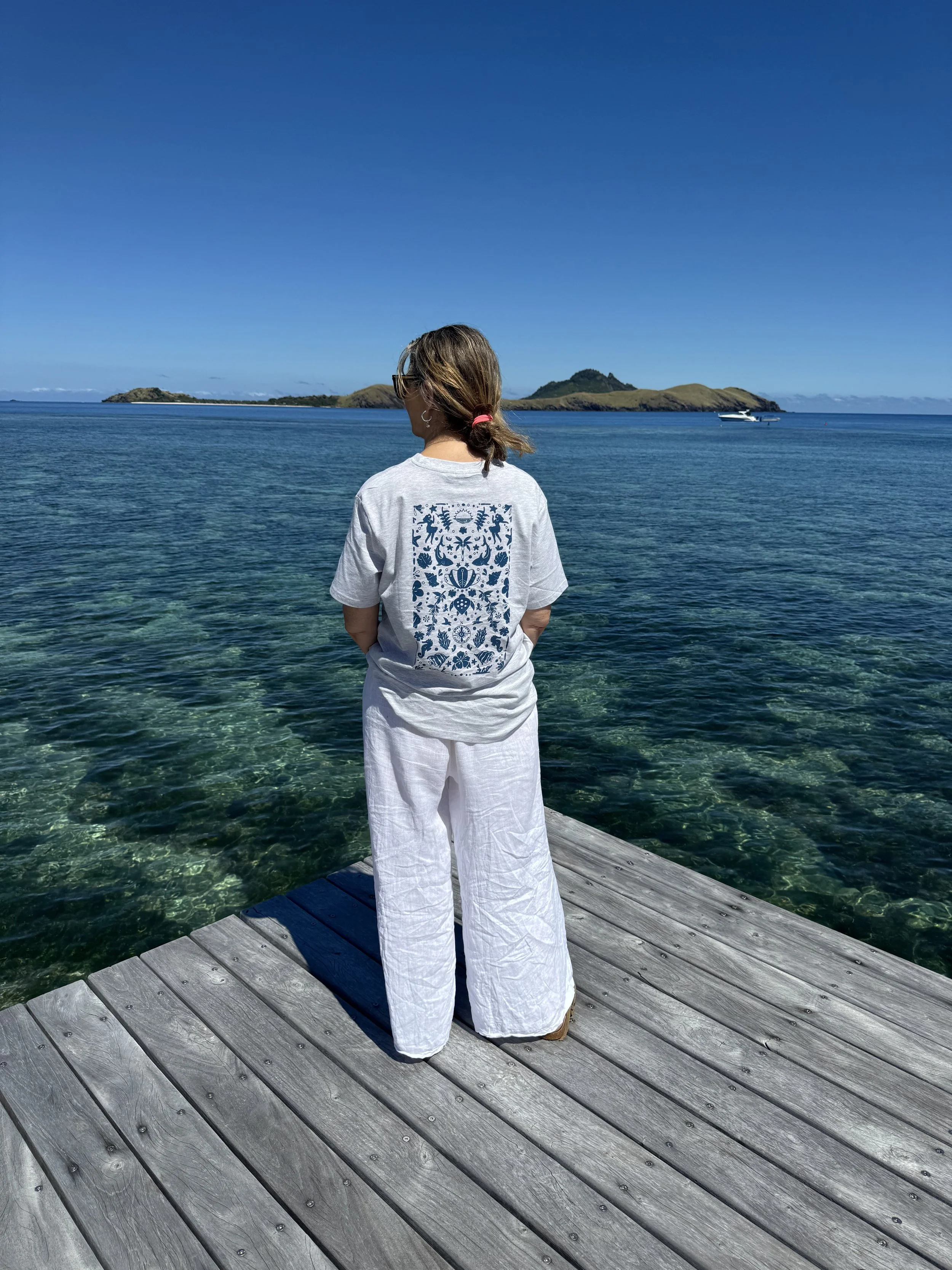 Dive Tee in Snow Marle and Petrol Blue available for purchase at Tokoriki Island Resort Dive Shop only