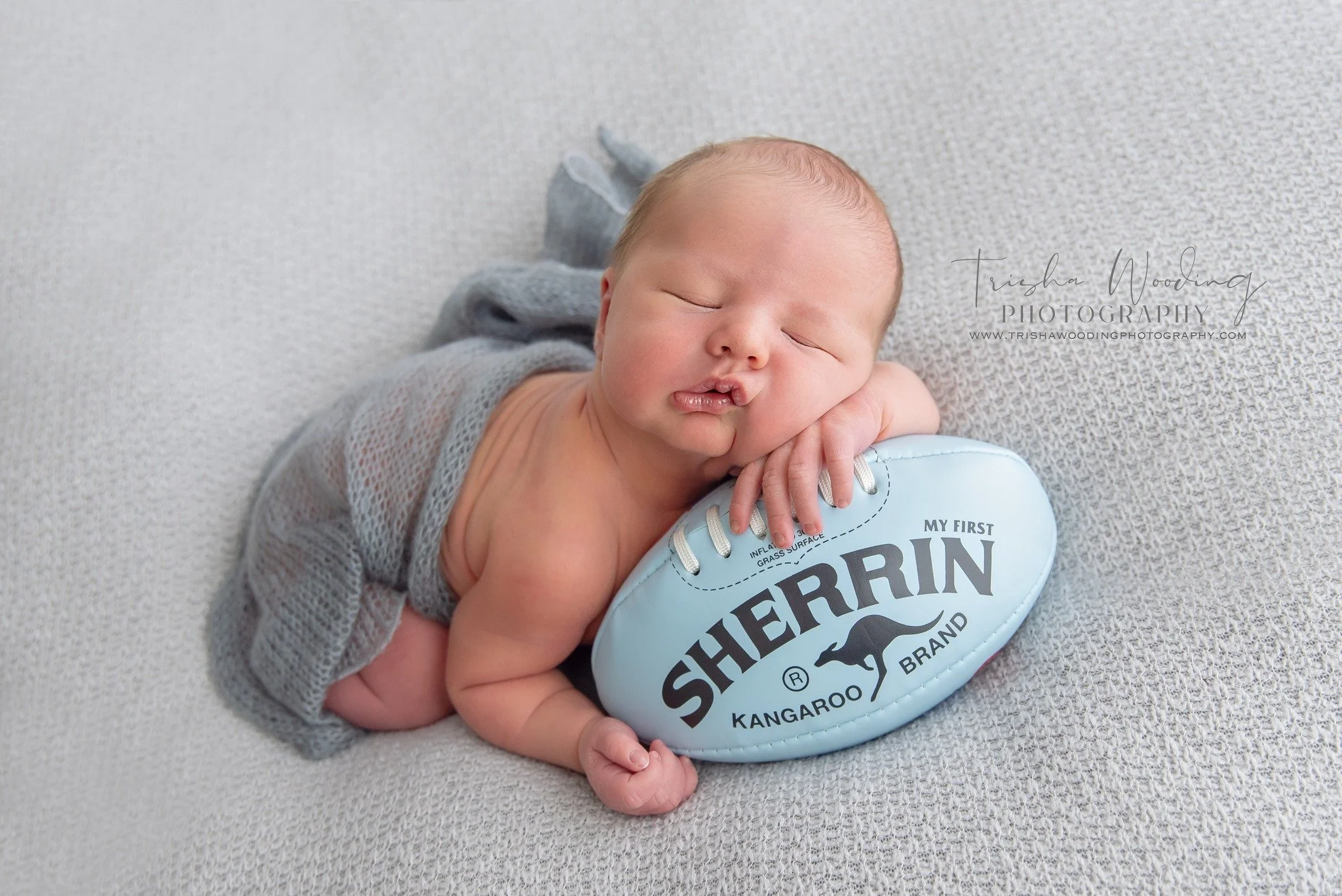 Same, same, but different

This is Thomas, and this gorgeous image is a recreation of his big brother Charlie&rsquo;s footy photo from 2024 (below). Moments like this are exactly why newborn sessions are so special. They&rsquo;re not just about captu