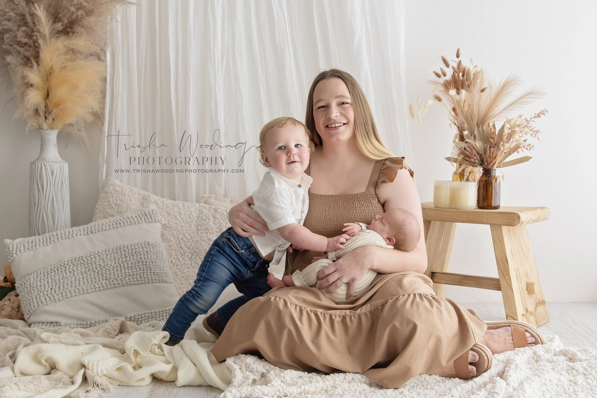 Katelyn was busy having a baby just 19 days ago, and was still pregnant when we held our first round of Mother's Day minis, so it was perfect timing when we decided to add some more minis and she could come in and capture her gorgeous family as a mot
