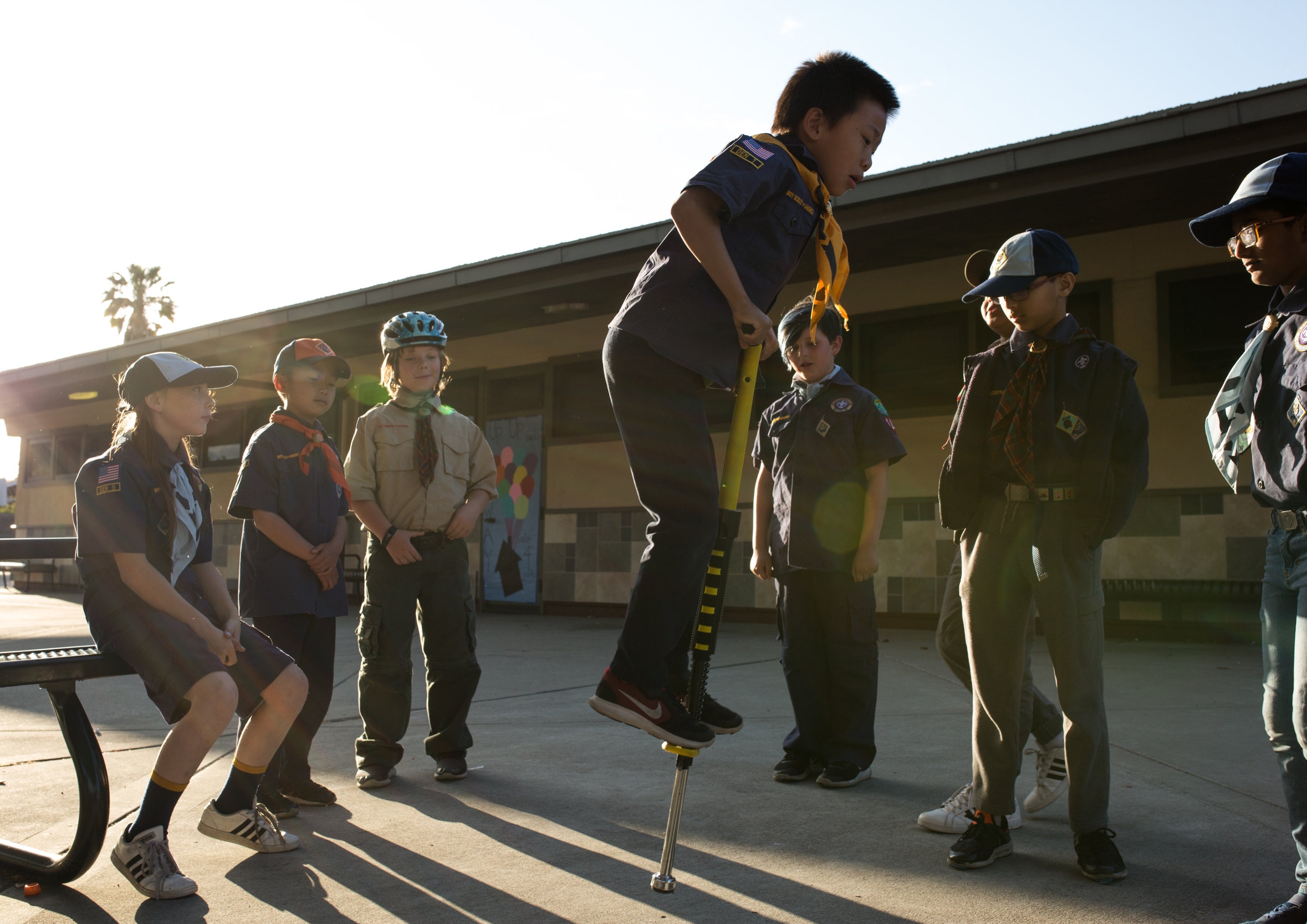 Paige, left, plays with her fellow Scouts before their Scouts BSA graduation ceremony in San Jose on May 16, 2018. Pack 317 was one of the first in California to integrate girls into their program following the rebranding of Boy Scouts to “Scouts BSA” last fall.