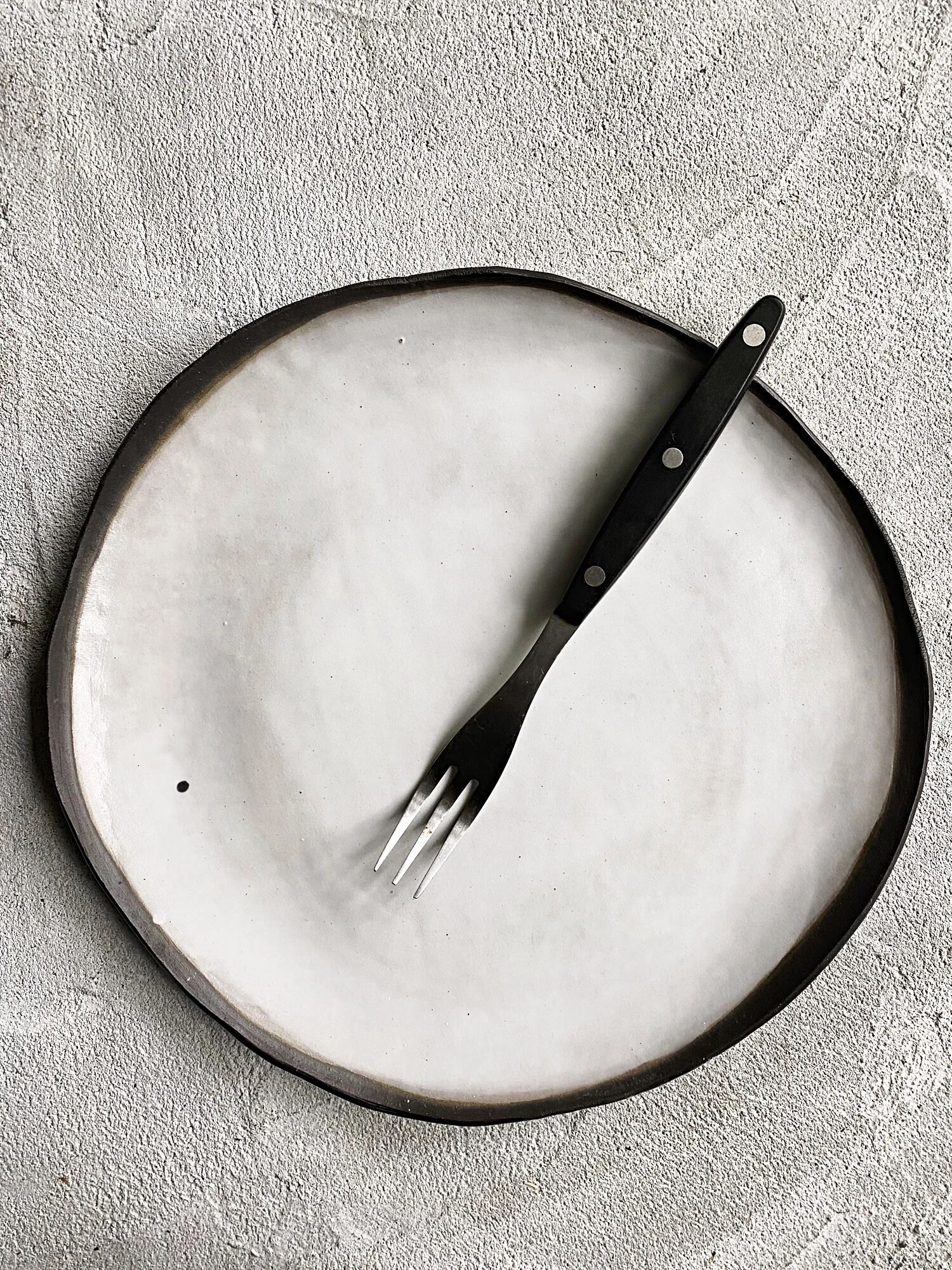 the D.T. dinner plate with beauty spot - SOLD