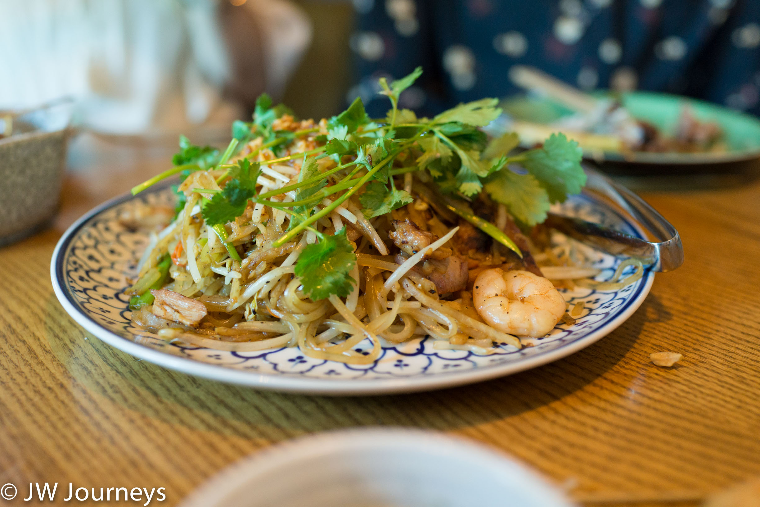 Anh and Chi stirred fried noodles