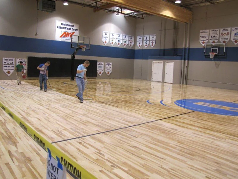 gym-floor-applying-finish-1.jpg