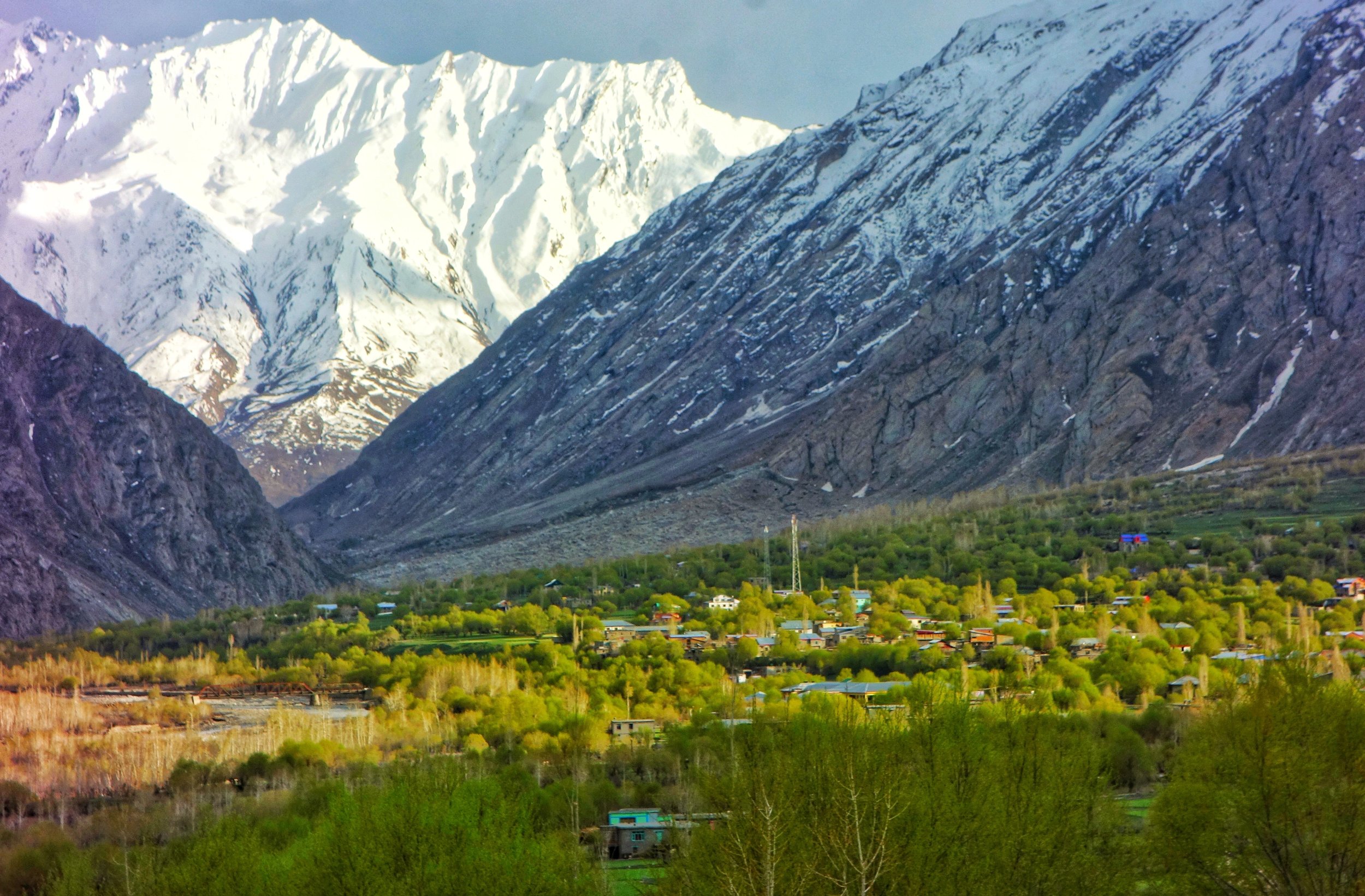 A view of the Sankoo Village and the Great Himalayan Range in the background