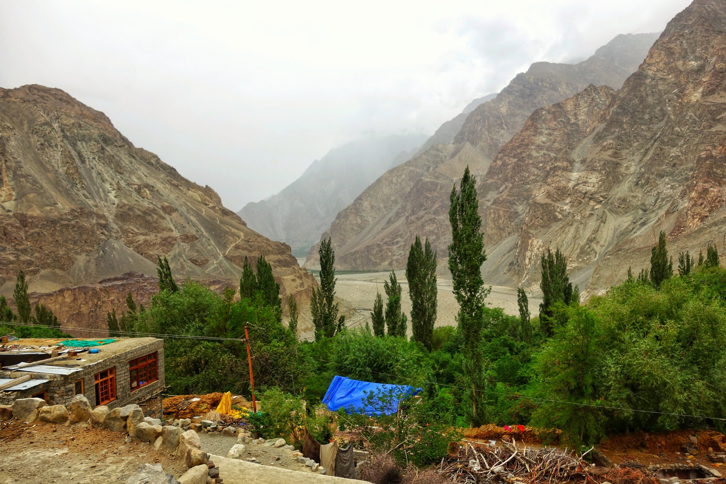 The Green patch in the distance at the bottom of the Mountains is the first Village, Phranu on the other side.