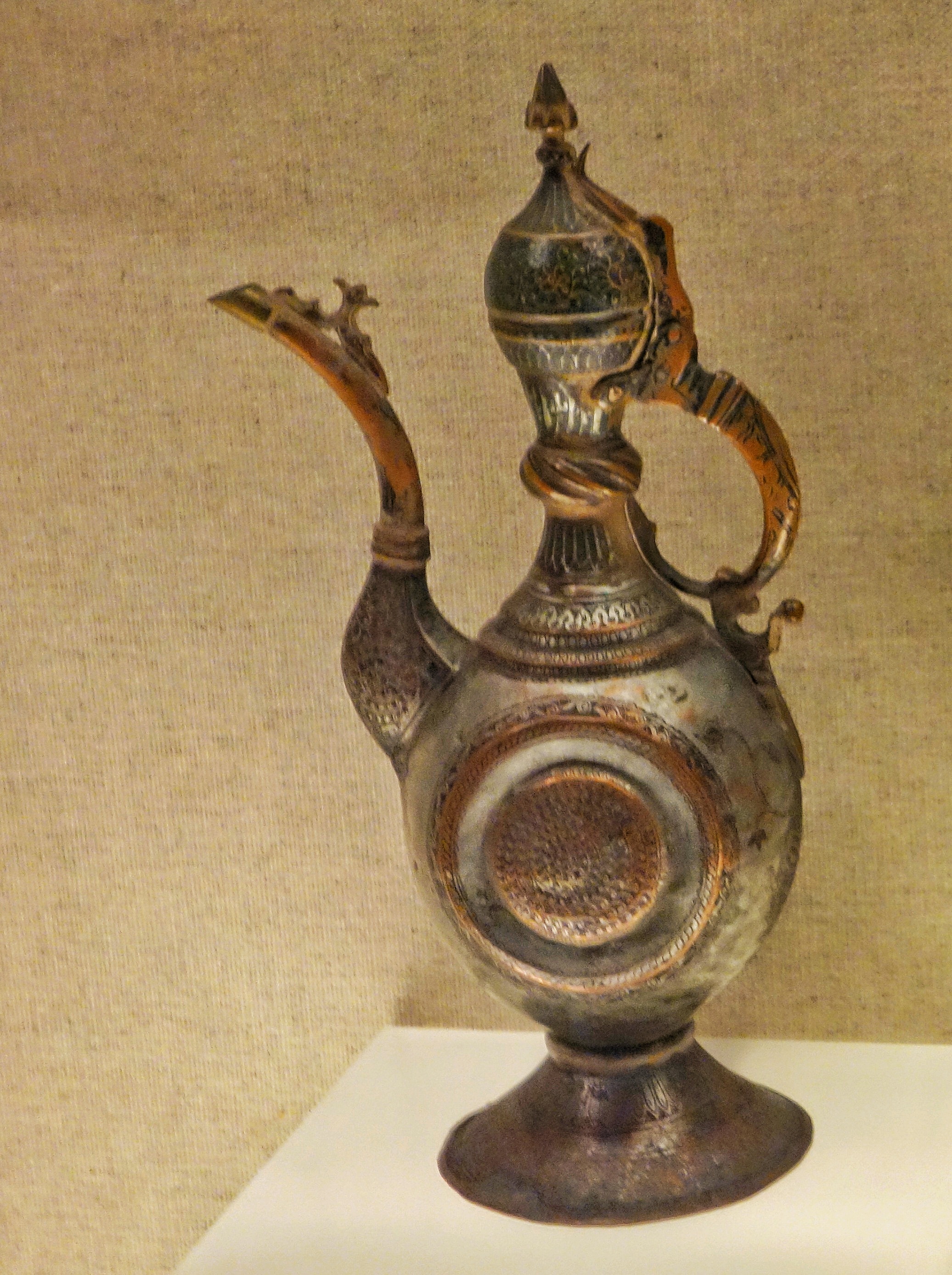 Ughyur Copper Pitcher with a Carved Motif and a Lacquered Inlay-01.jpeg