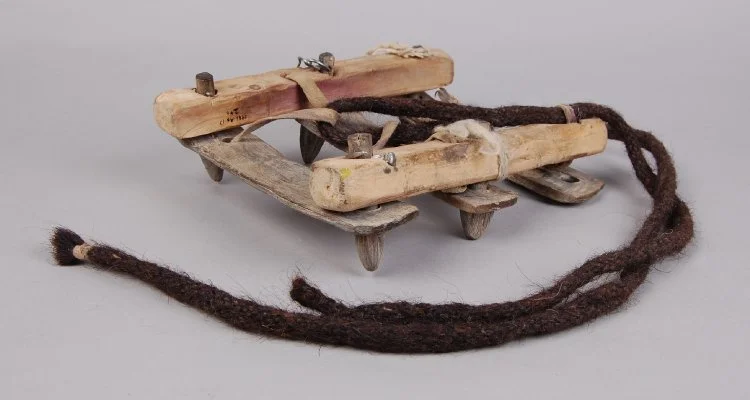A Crampon made of Wood and Hide.