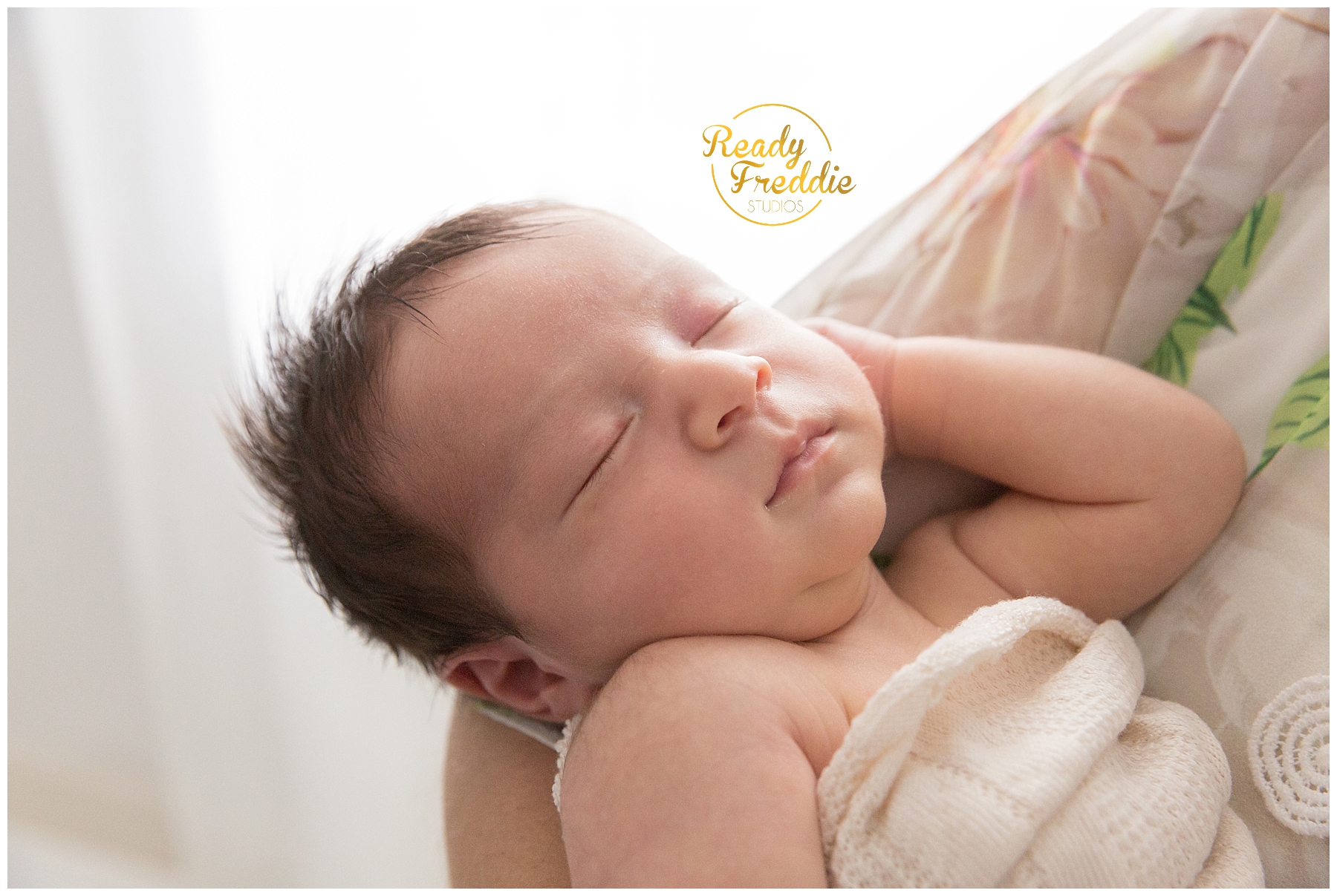 newborn baby sleeping during is photosession