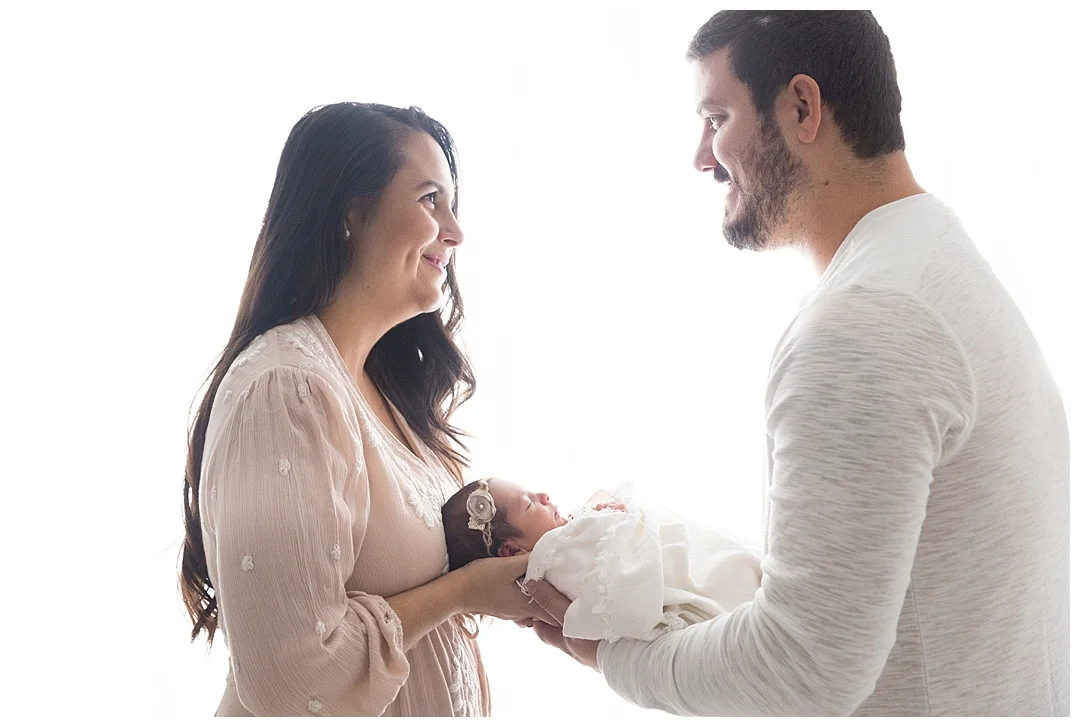 mom and dad with newborn photography studio | miami newborn photographer