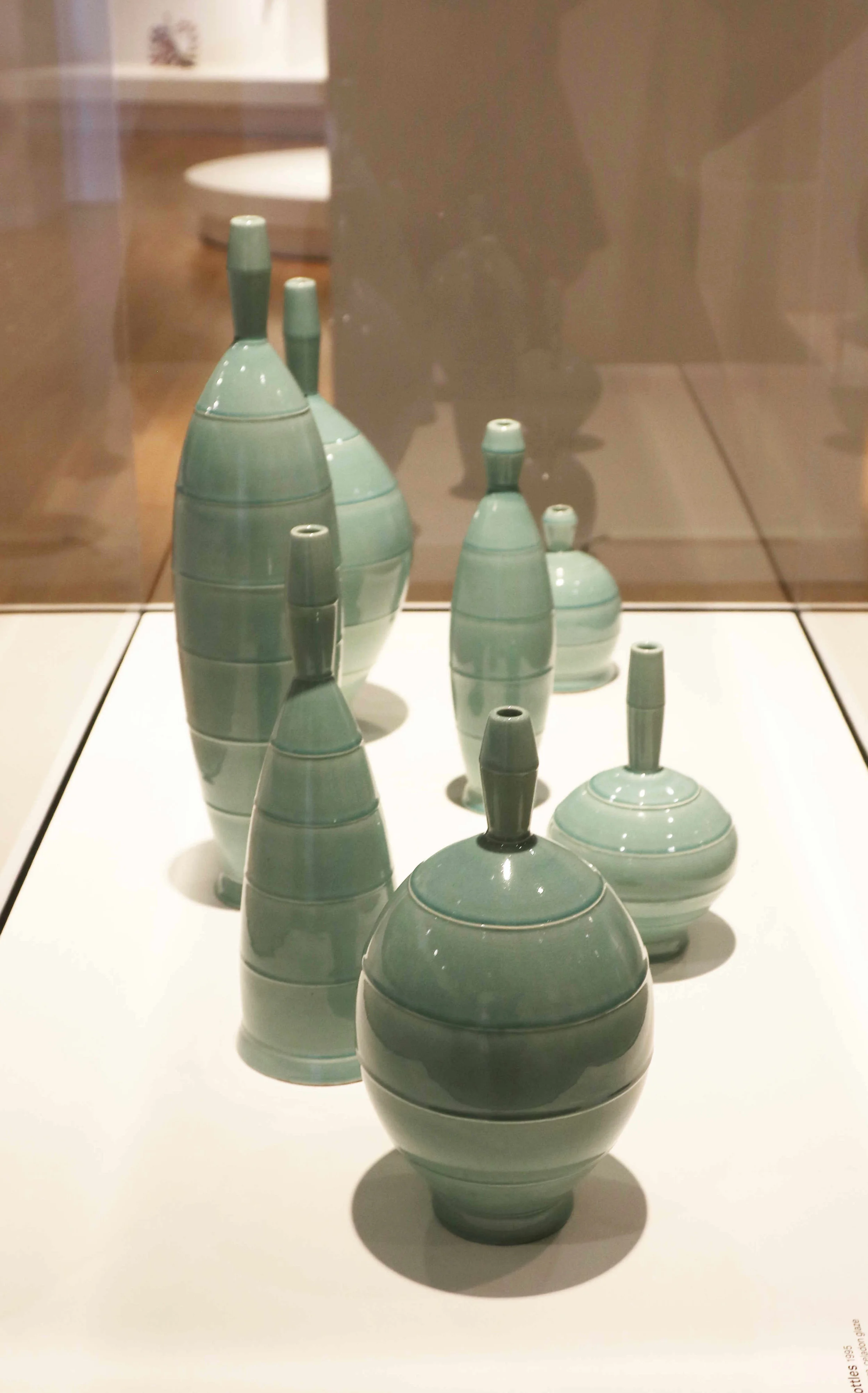 Michael Sherrill, Aqua Bottles, 1995. White Stoneware, celadon glaze.