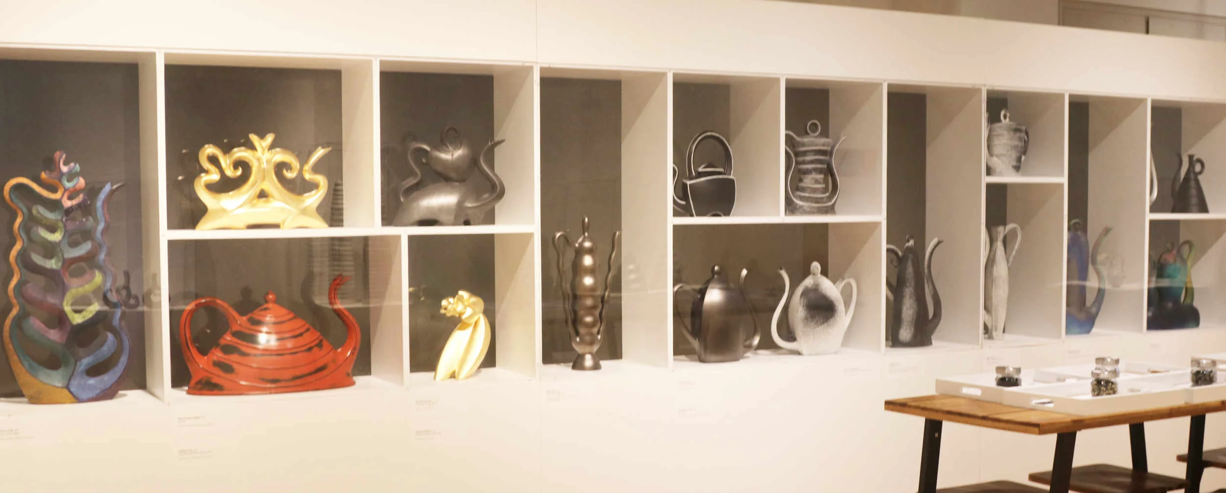 Broad sculptural teapot view.