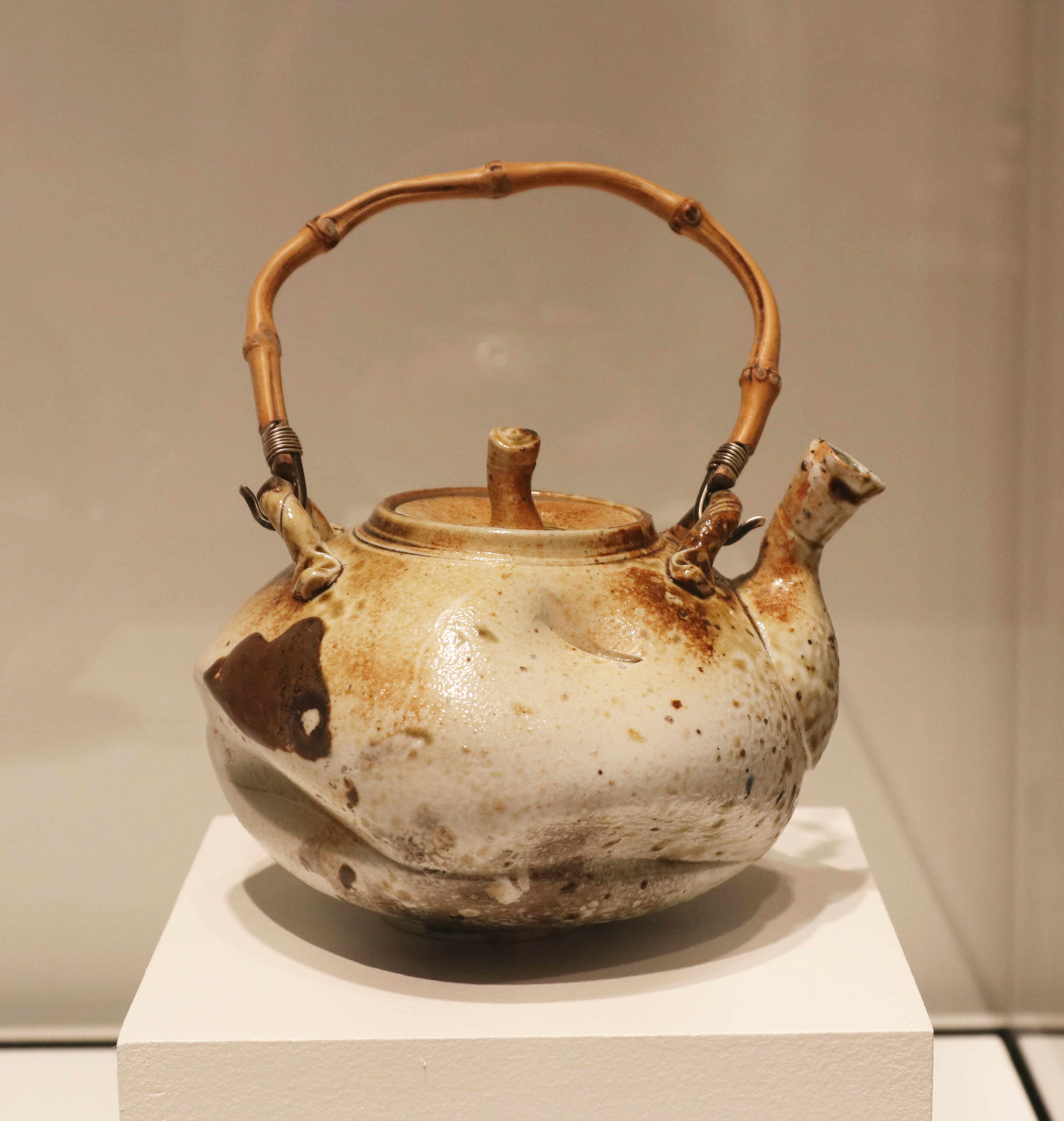 Michael Sherrill, Fire Box Tea, 1968. Porcelain, ash glaze handle; silver, bamboo.